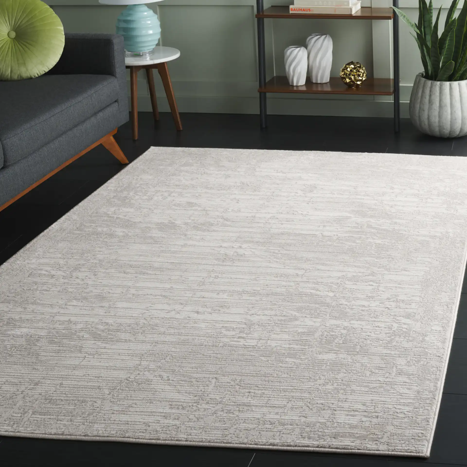 Memphis Distressed Linear Rug in Gray / Ivory in a styled room