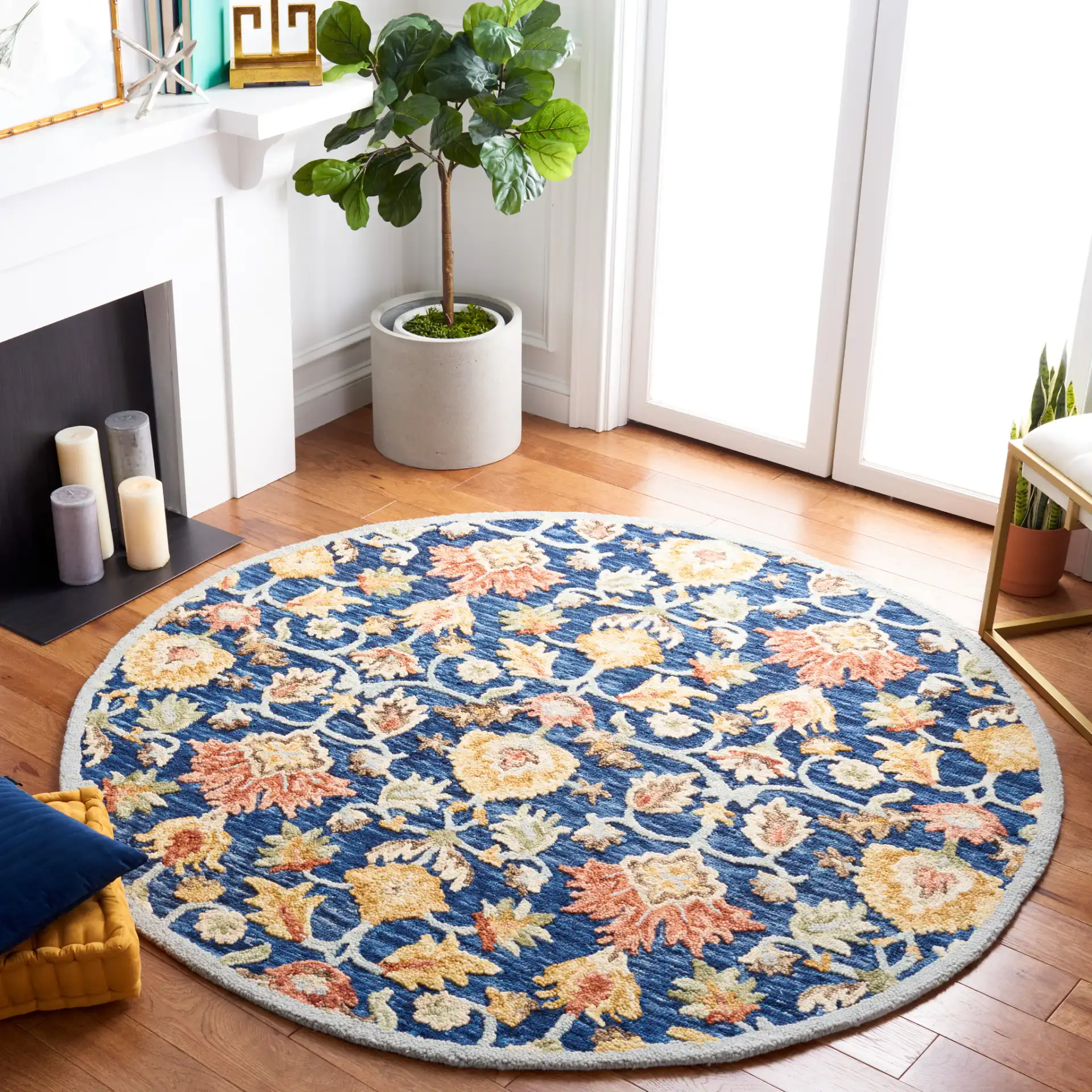 Metro Allover Floral Hand-Tufted Wool Rug in Blue / Orange in a styled room