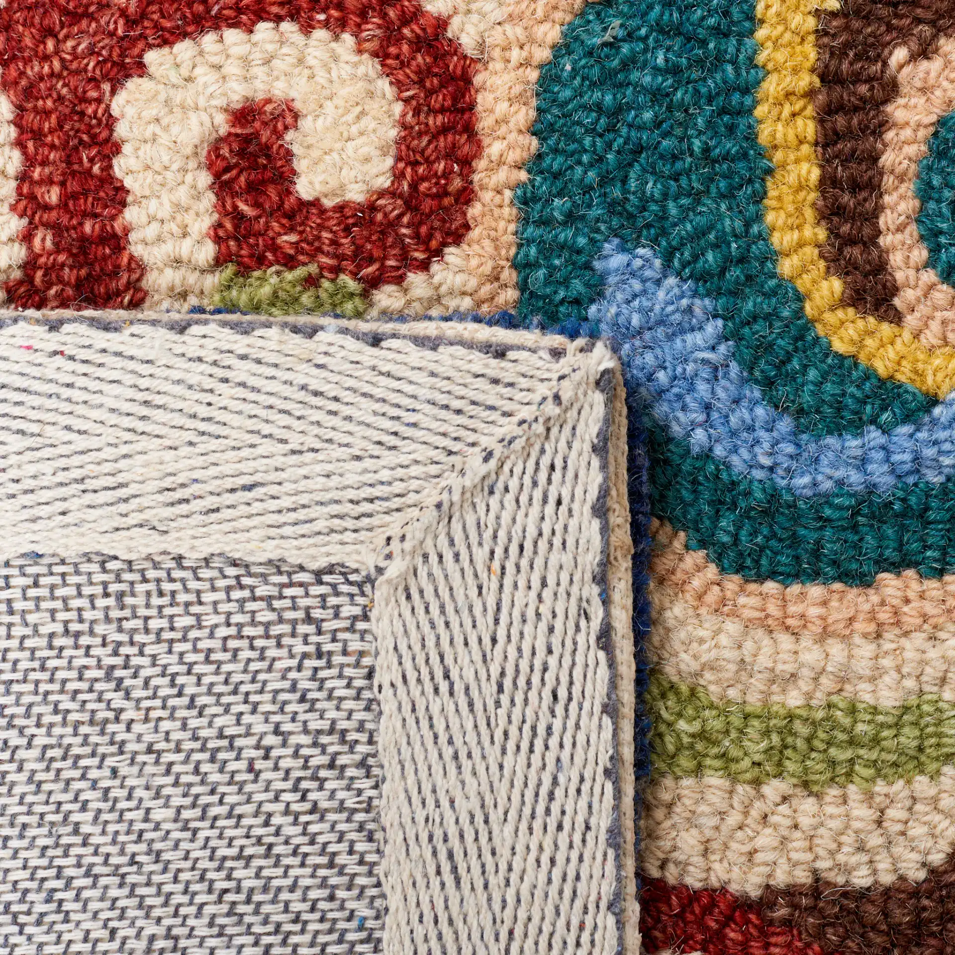 Metro Damask Scroll Trellis Hand-Tufted Wool Rug in Beige / Blue in a styled room
