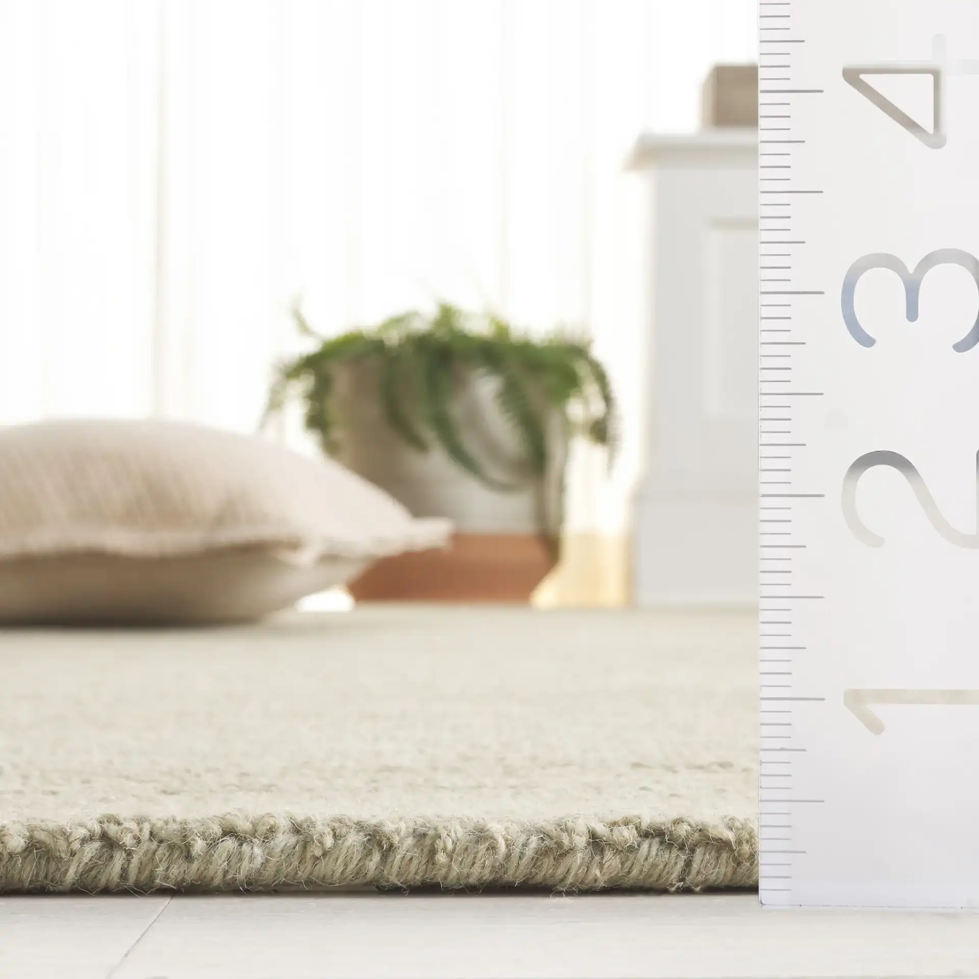 Metro Modern Heathered Hand-Tufted Wool Rug in Green in a styled room