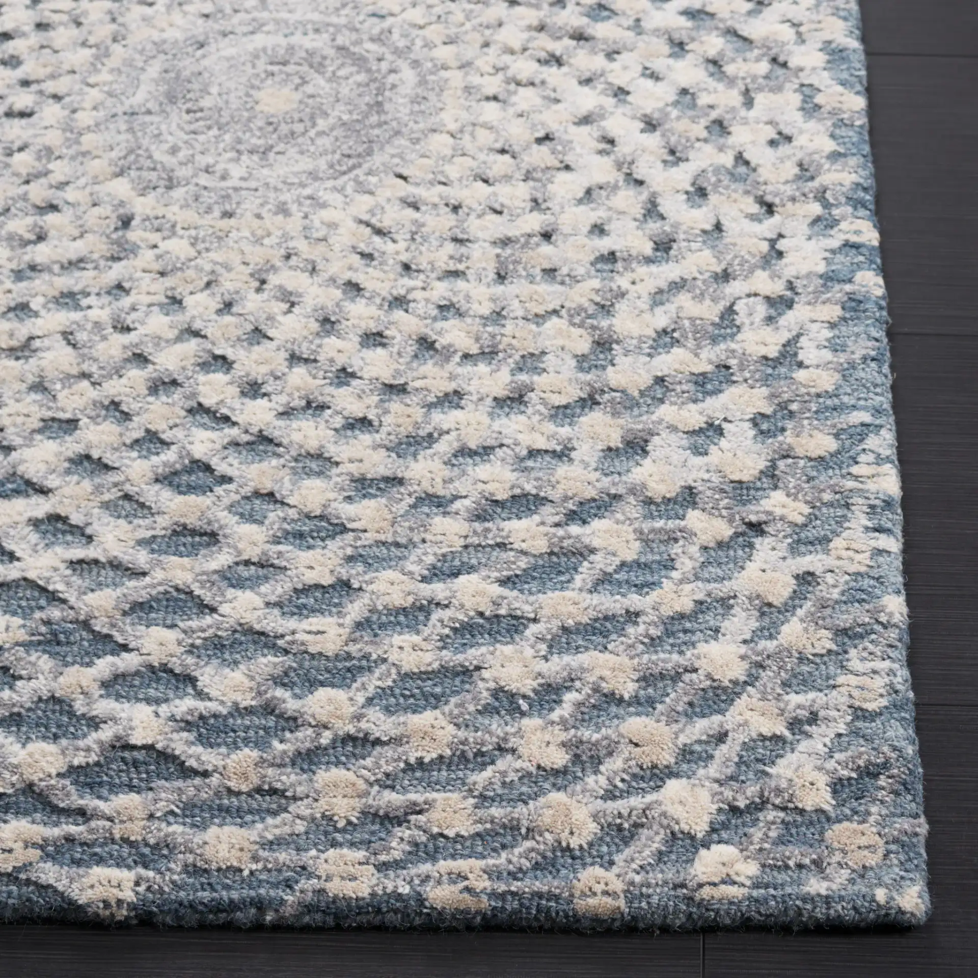 Metro Modern Concentric Ripple Hand-Tufted Wool Rug in Gray / Beige in a styled room