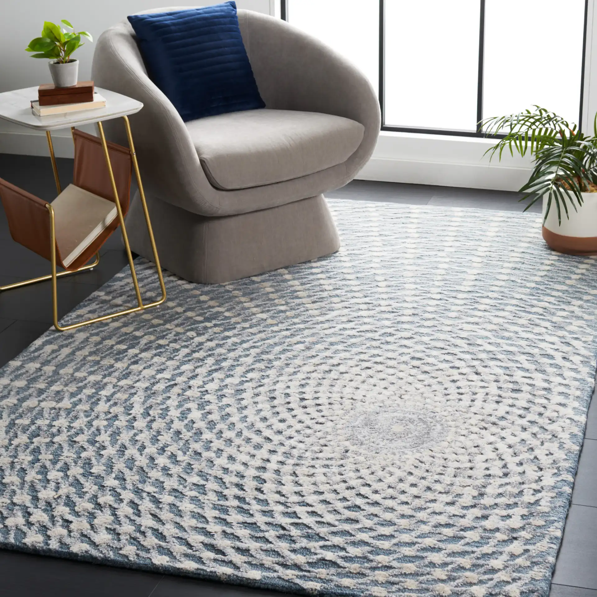 Metro Modern Concentric Ripple Hand-Tufted Wool Rug in Gray / Beige in a styled room
