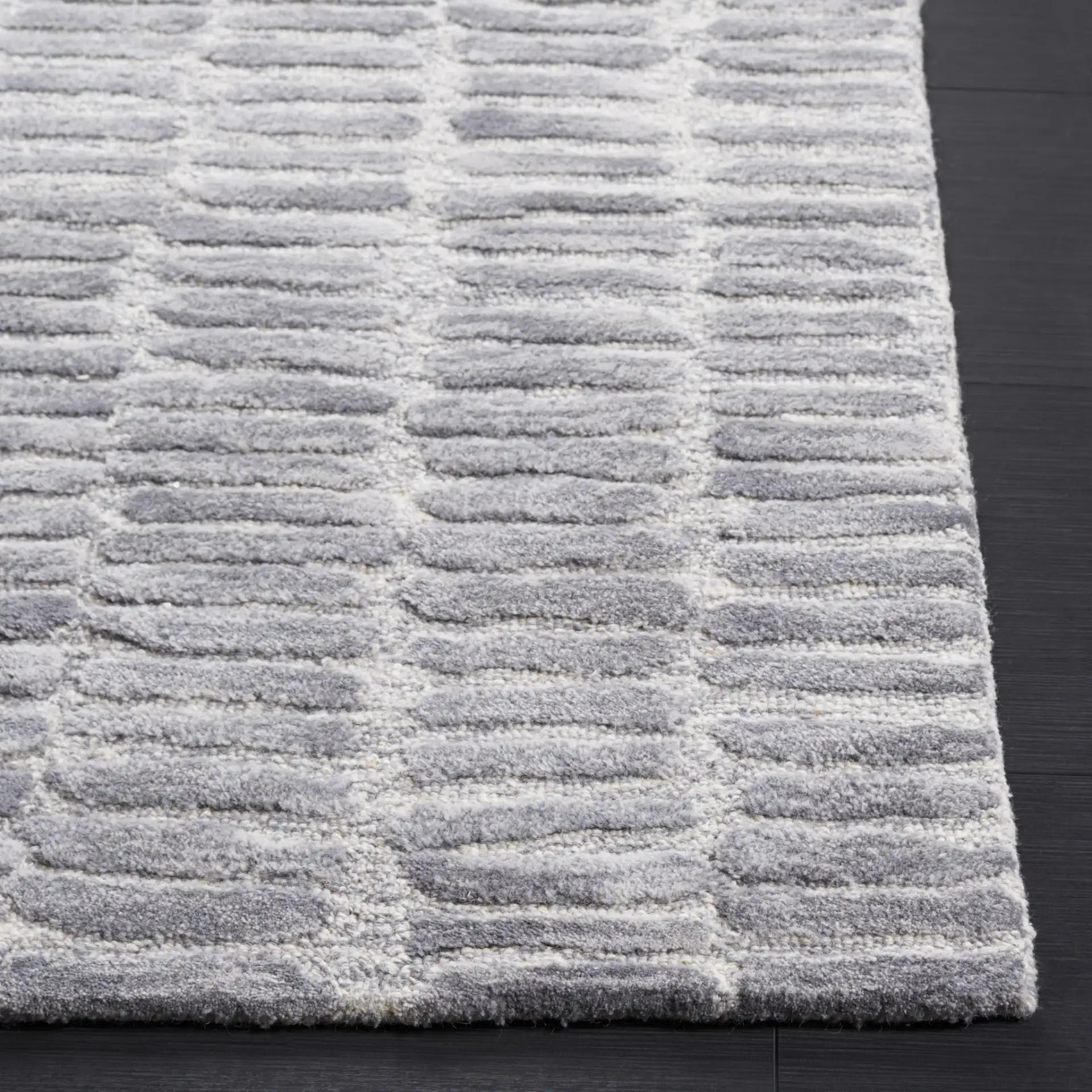 Metro Dashed Stripe Hand-Tufted Wool Rug in Silver / Gray in a styled room