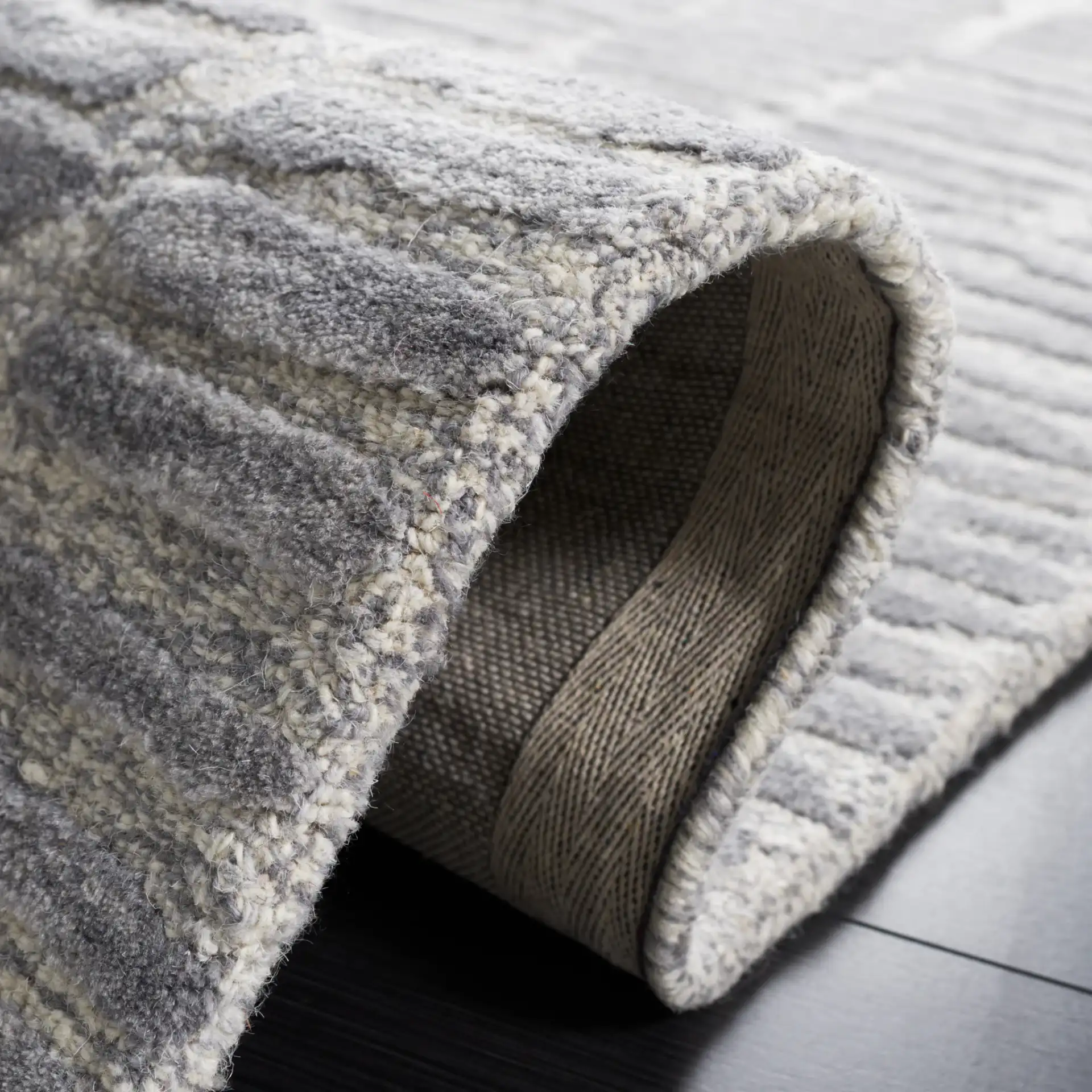 Metro Dashed Stripe Hand-Tufted Wool Rug in Silver / Gray in a styled room