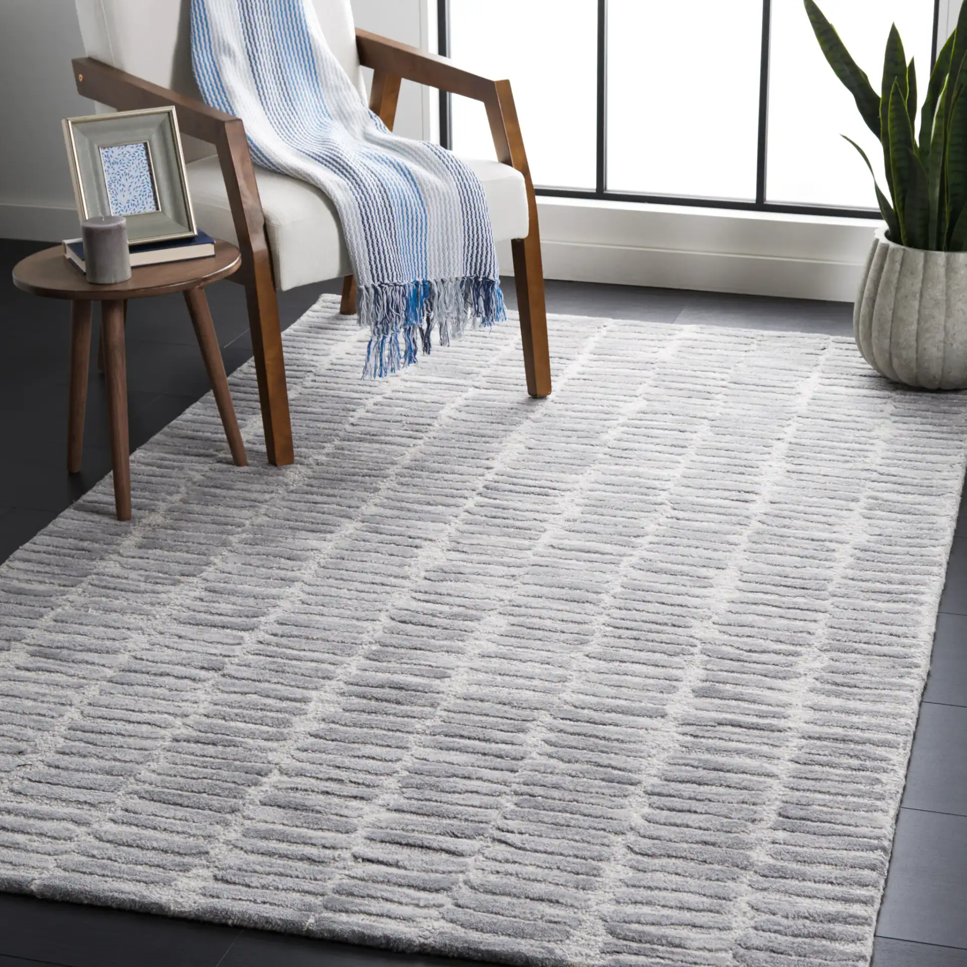 Metro Dashed Stripe Hand-Tufted Wool Rug in Silver / Gray in a styled room
