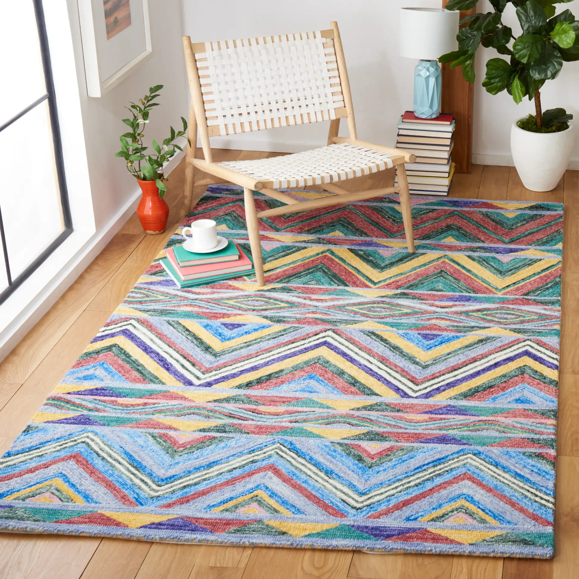 Metro Southwestern Chevron Hand-Tufted Wool Rug in Red / Blue in a styled room