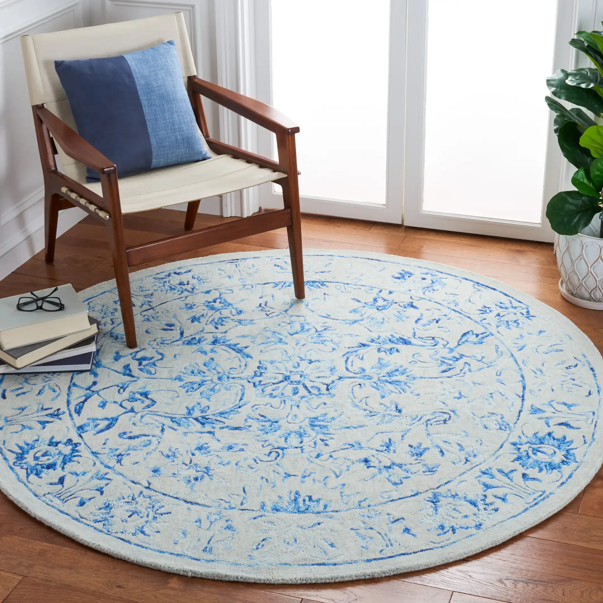 Metro Floral Arabesque Hand-Tufted Wool Rug in Blue / Beige in a styled room