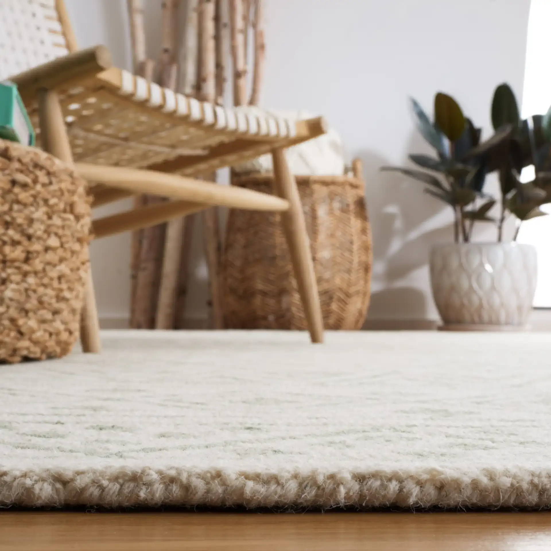 Metro Geometric Banded Hand-Tufted Wool Rug in Ivory / Light Green in a styled room