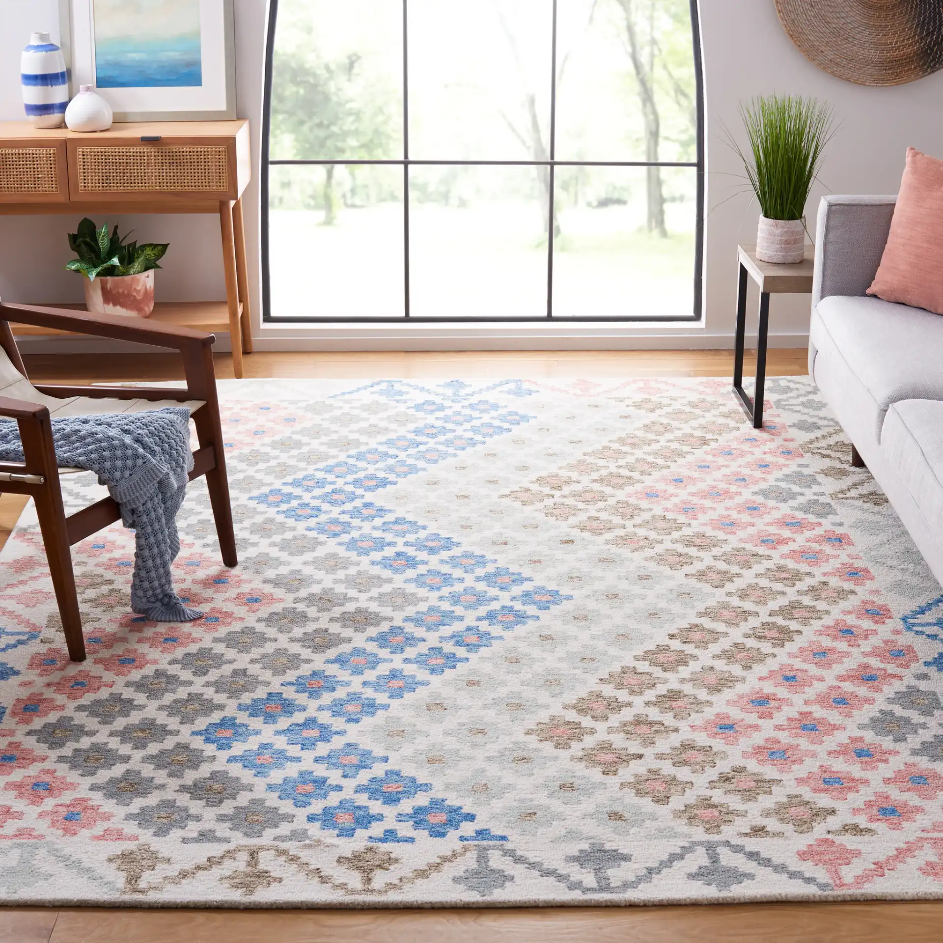 Metro Tribal Chevron Hand-Tufted Wool Rug in Ivory / Blue in a styled room