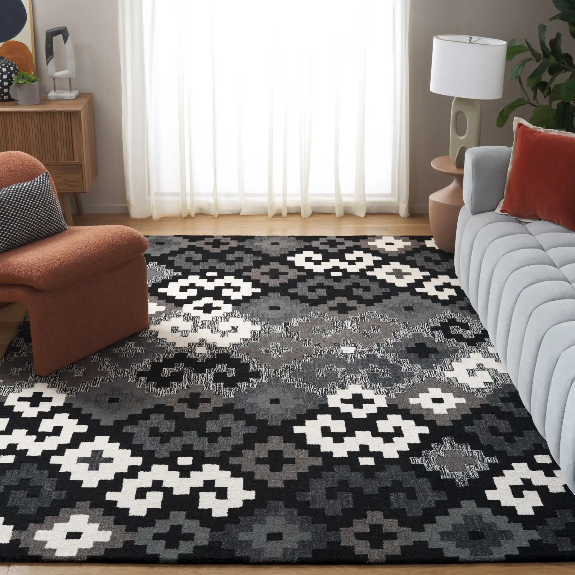 Metro Stepped Geometric Hand-Tufted Wool Rug in Black / Ivory in a styled room