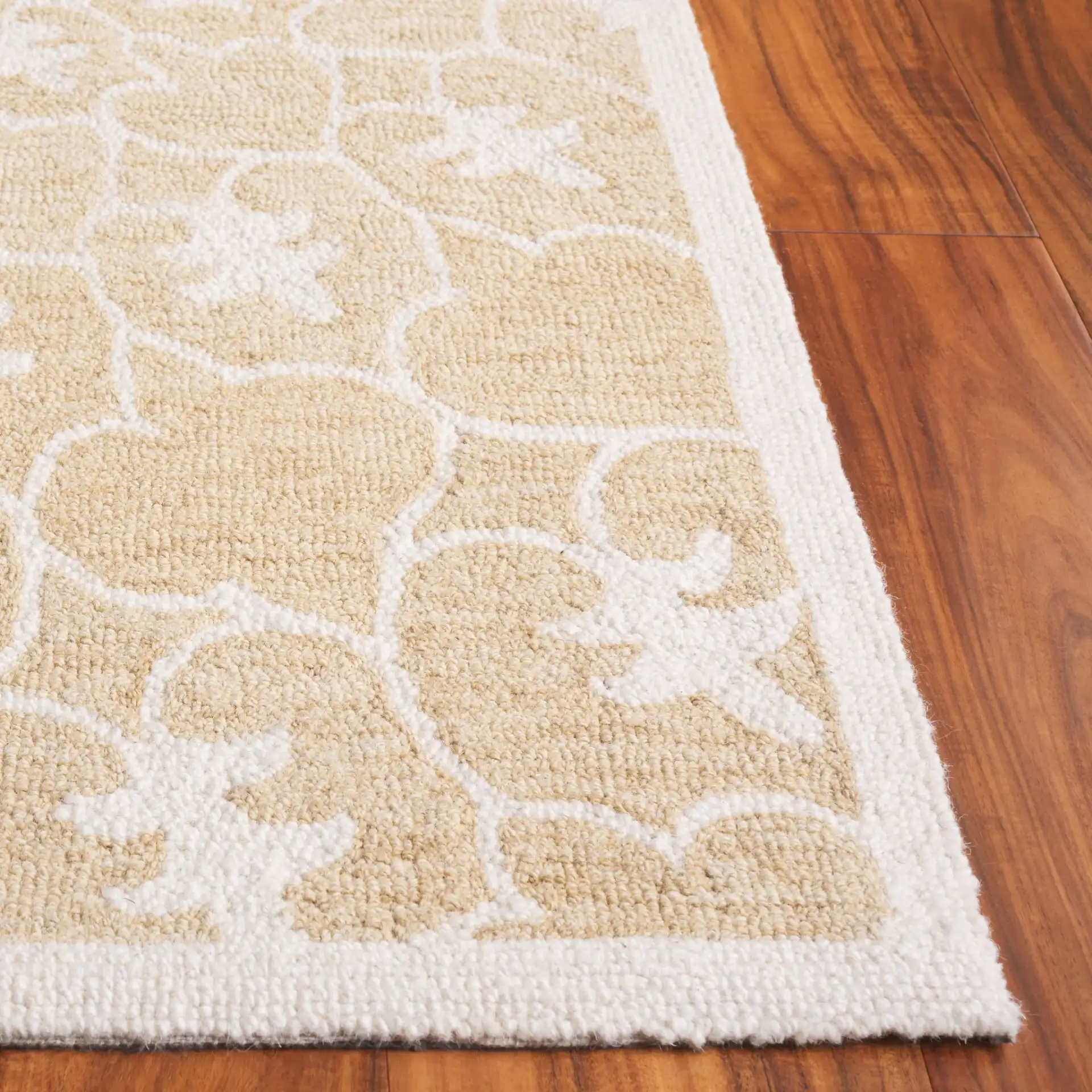 Metro Radial Medallion Hand-Tufted Wool Rug in Gold / Ivory in a styled room
