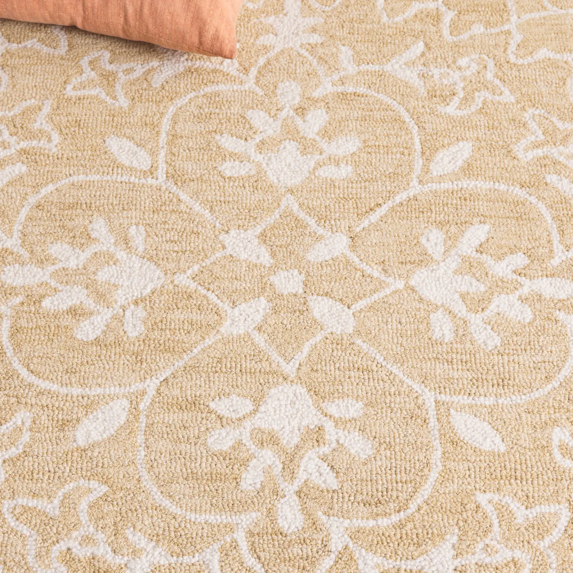 Metro Radial Medallion Hand-Tufted Wool Rug in Gold / Ivory in a styled room