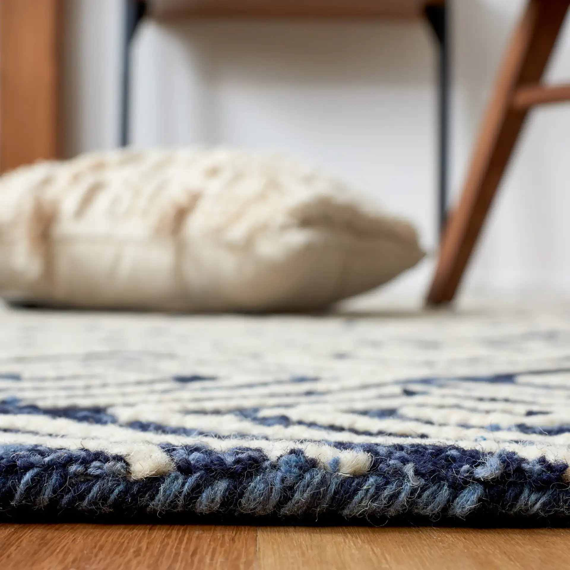 Metro Maze Hand-Tufted Wool Rug in Navy / Ivory in a styled room