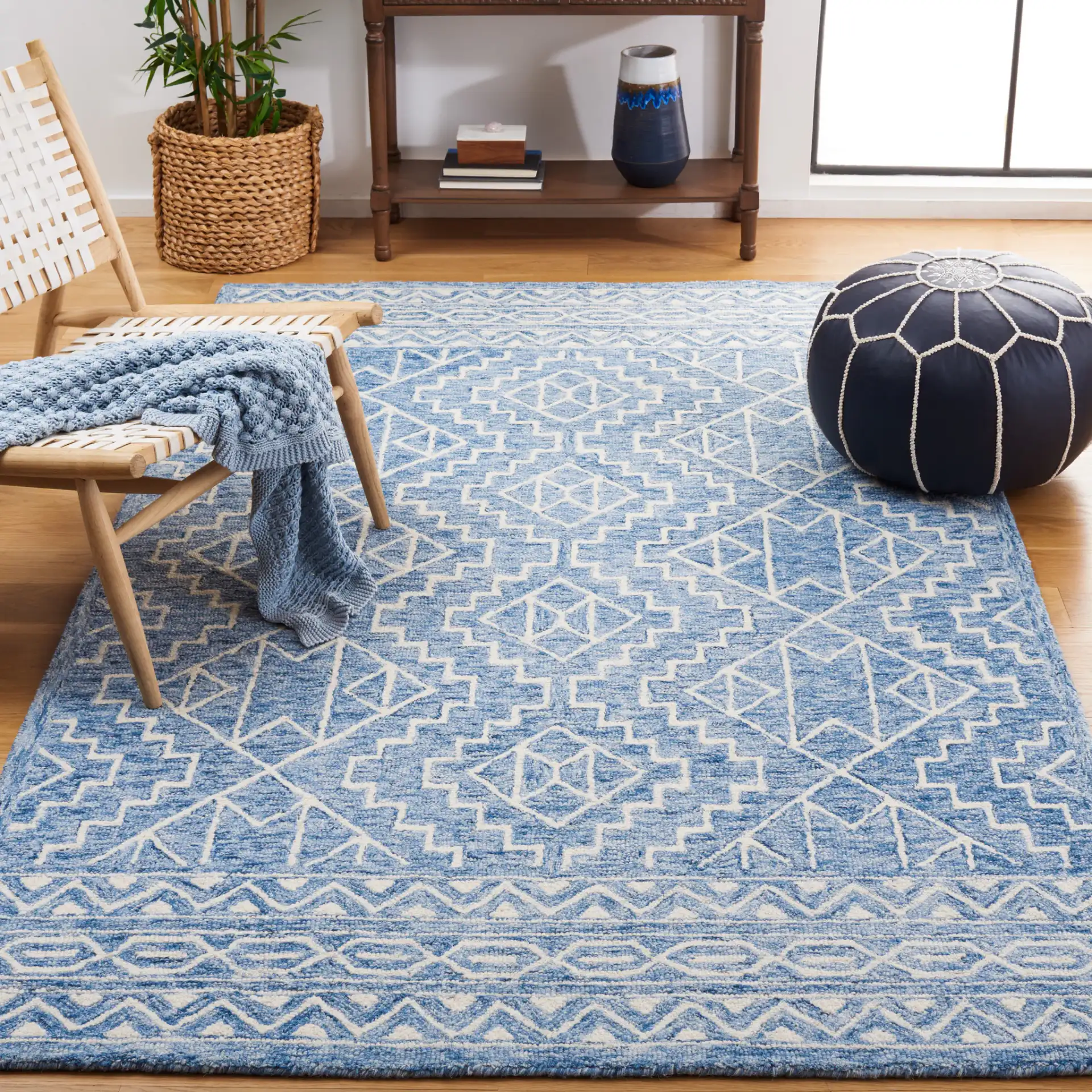 Metro Stepped Outline Diamond Hand-Tufted Wool Rug in Blue / Ivory in a styled room