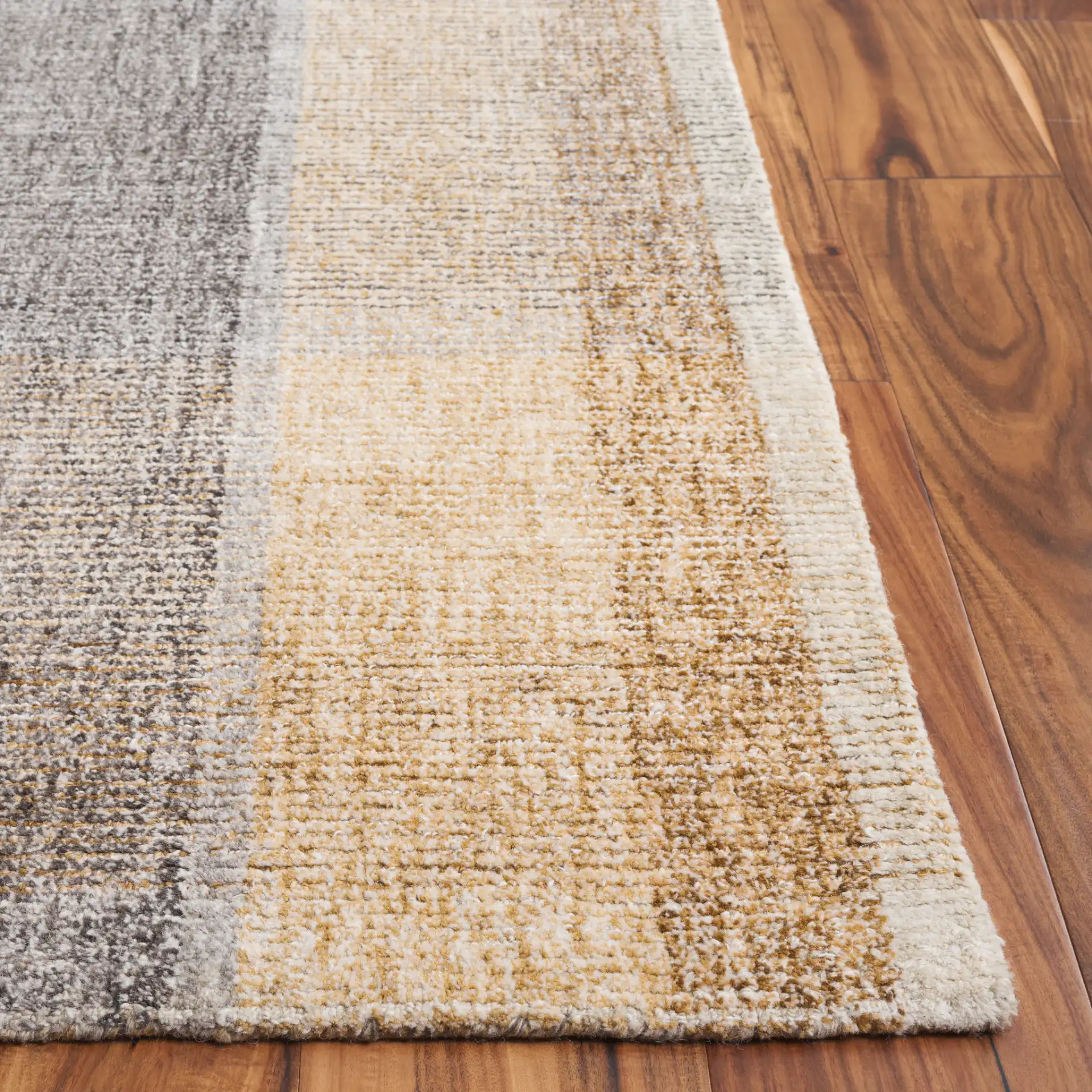 Metro Plaid Hand-Tufted Wool Rug in Light Brown / Blue in a styled room