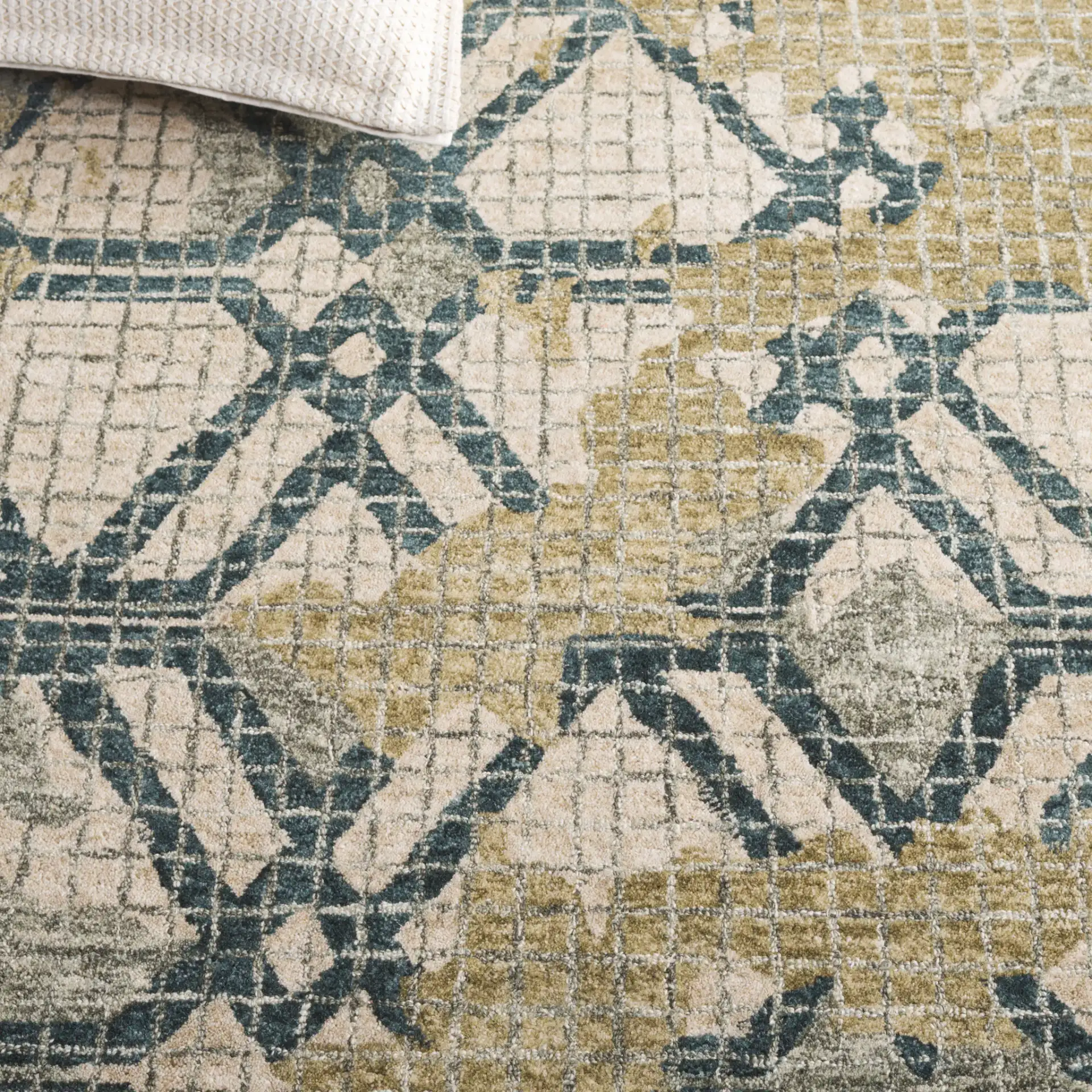 Metro Lattice Hand-Tufted Wool Rug in Green / Beige in a styled room