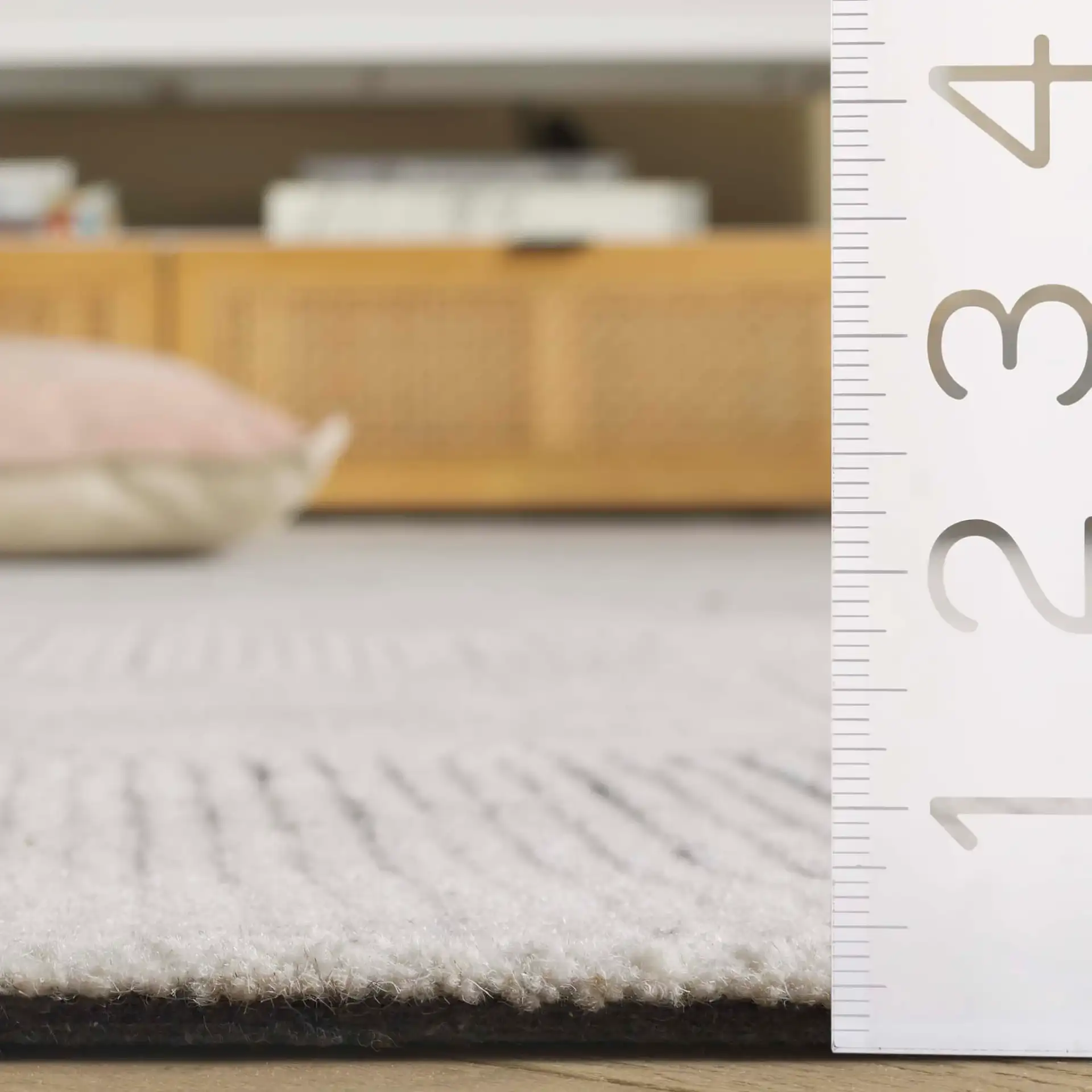 Metro Modern Checkerboard Hand-Tufted Wool Rug in Ivory / Charcoal in a styled room
