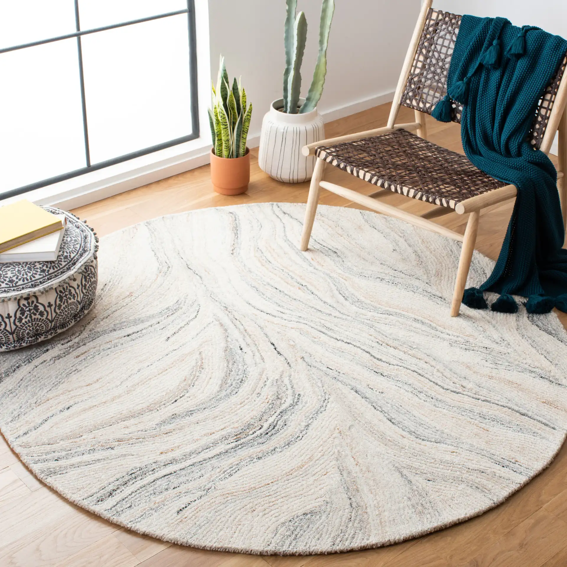 Metro Wavy Line Hand-Tufted Wool Rug in Ivory / Gray in a styled room