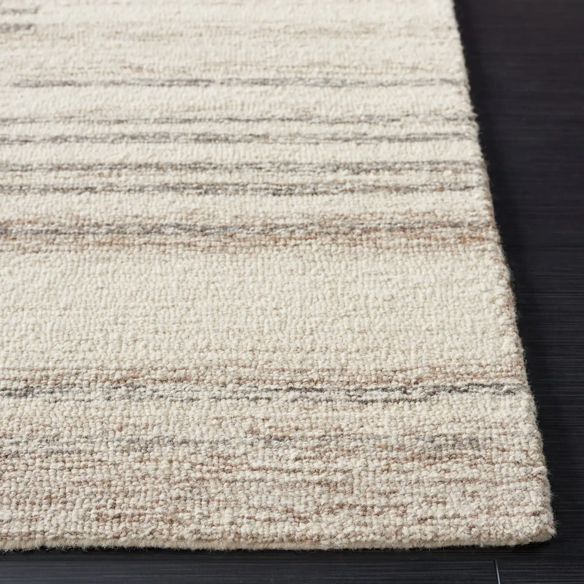 Metro Modern Broken Stripe Hand-Tufted Wool Rug in Ivory / Brown in a styled room