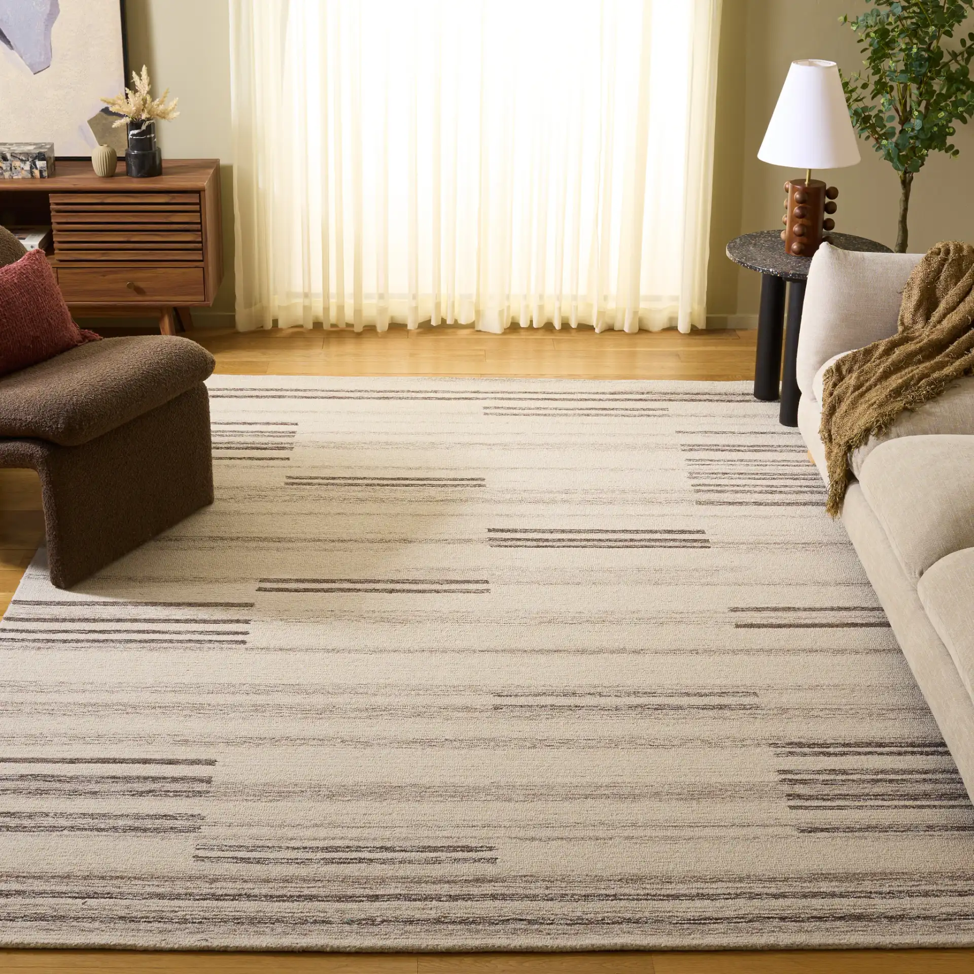 Metro Modern Broken Stripe Hand-Tufted Wool Rug in Ivory / Brown in a styled room