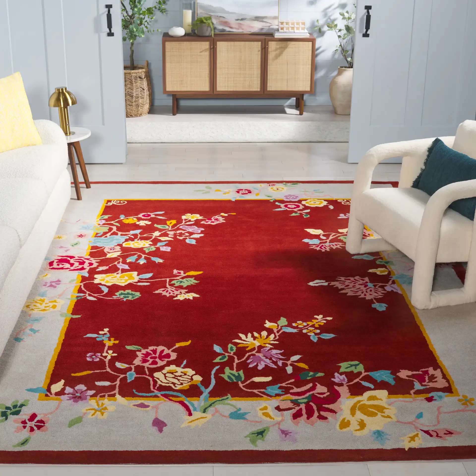 Metro Trailing Floral Border Hand-Tufted Wool Rug in Rust / Beige in a styled room