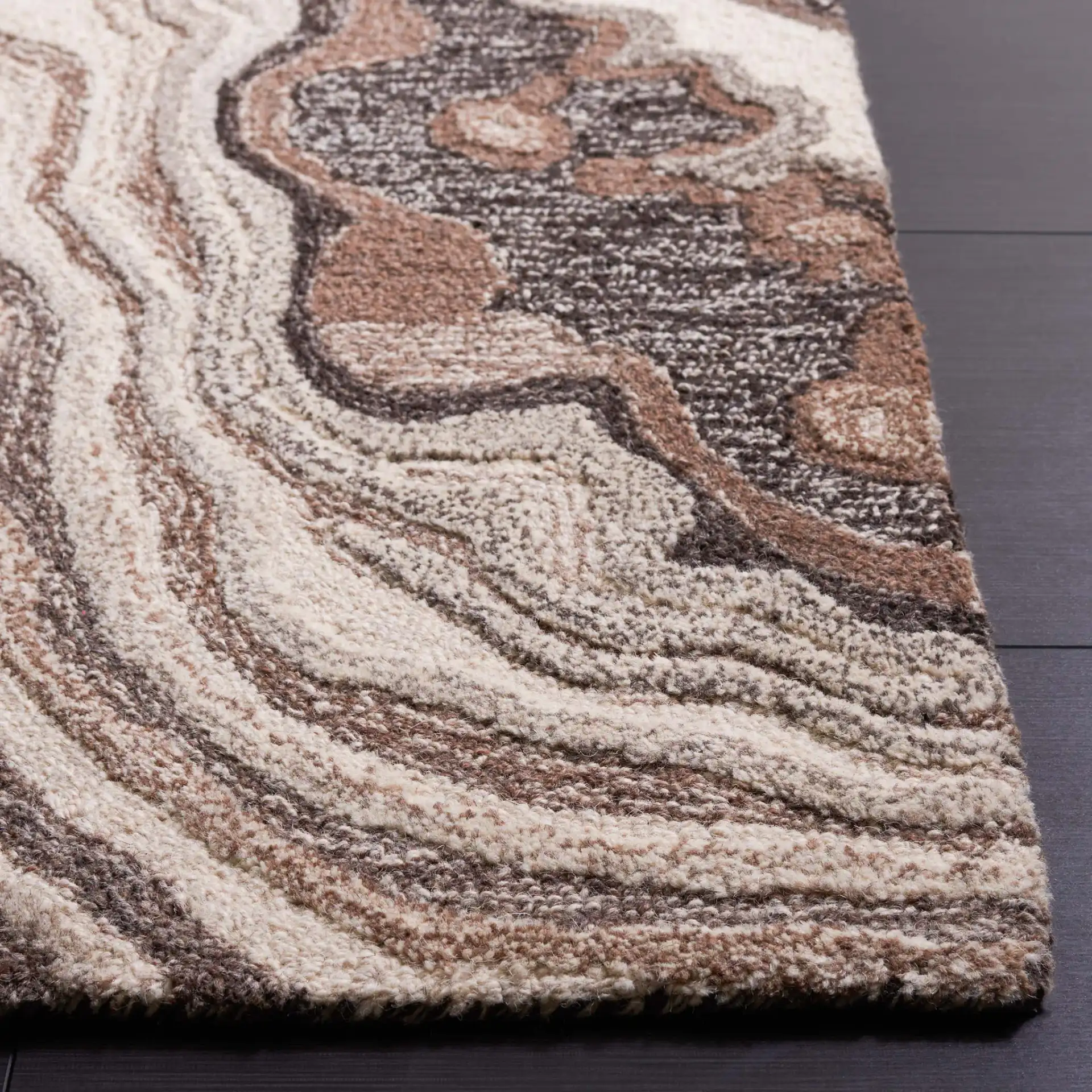 Metro Swirl Marble Hand-Tufted Wool Rug in Brown / Ivory in a styled room