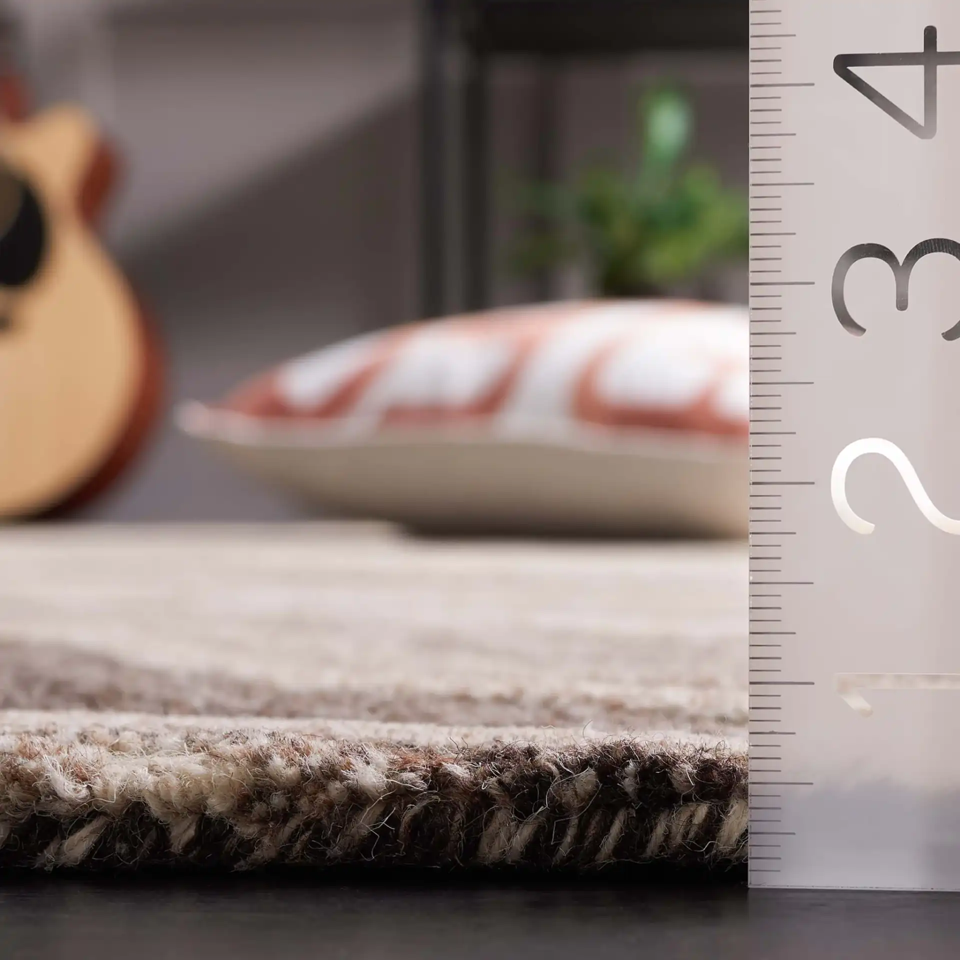 Metro Swirl Marble Hand-Tufted Wool Rug in Brown / Ivory in a styled room