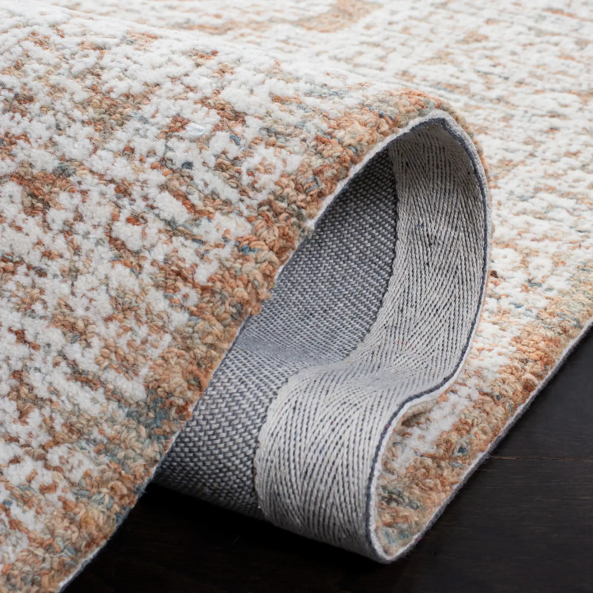 Metro Geometric Tile Hand-Tufted Wool Rug in Natural / Rust in a styled room