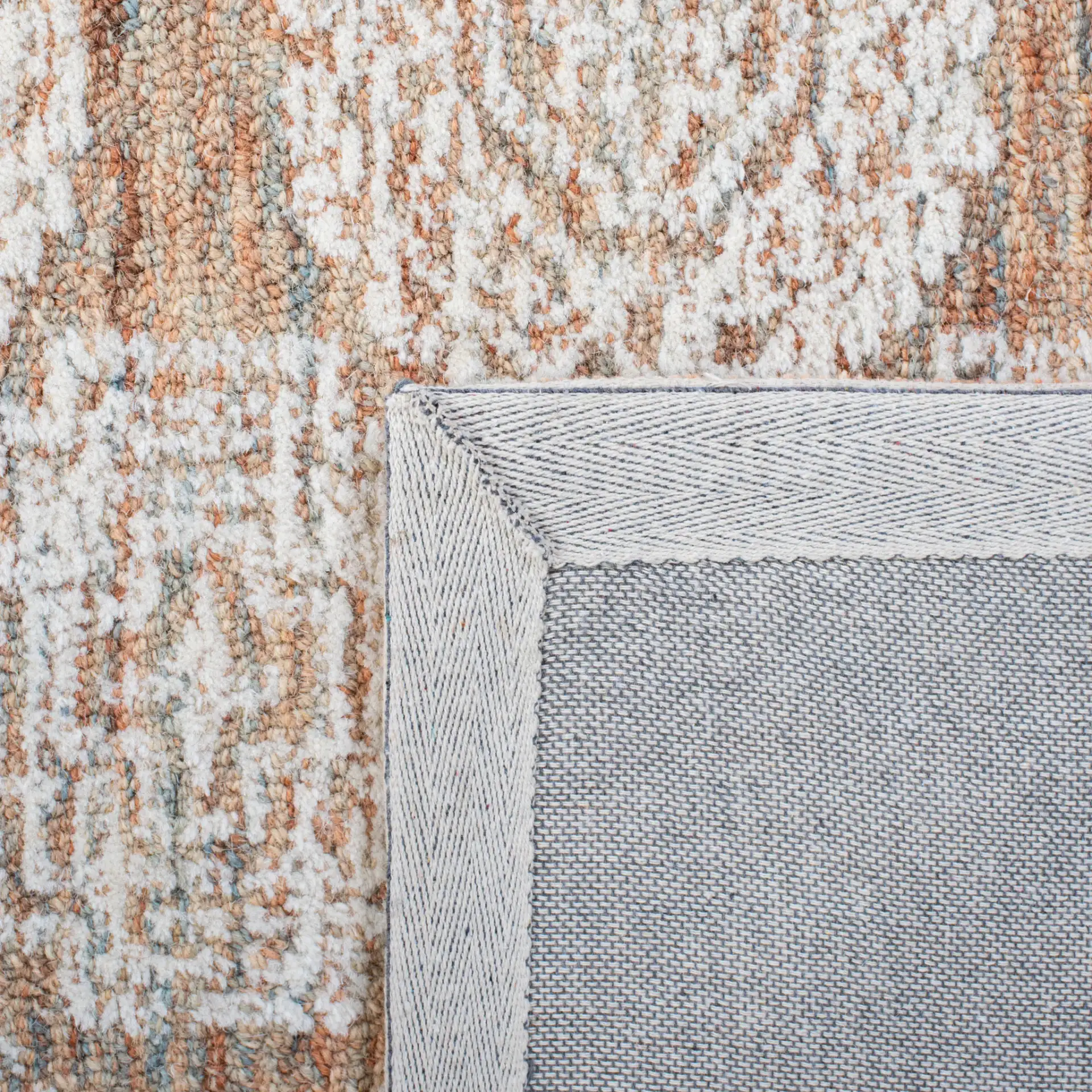 Metro Geometric Tile Hand-Tufted Wool Rug in Natural / Rust in a styled room