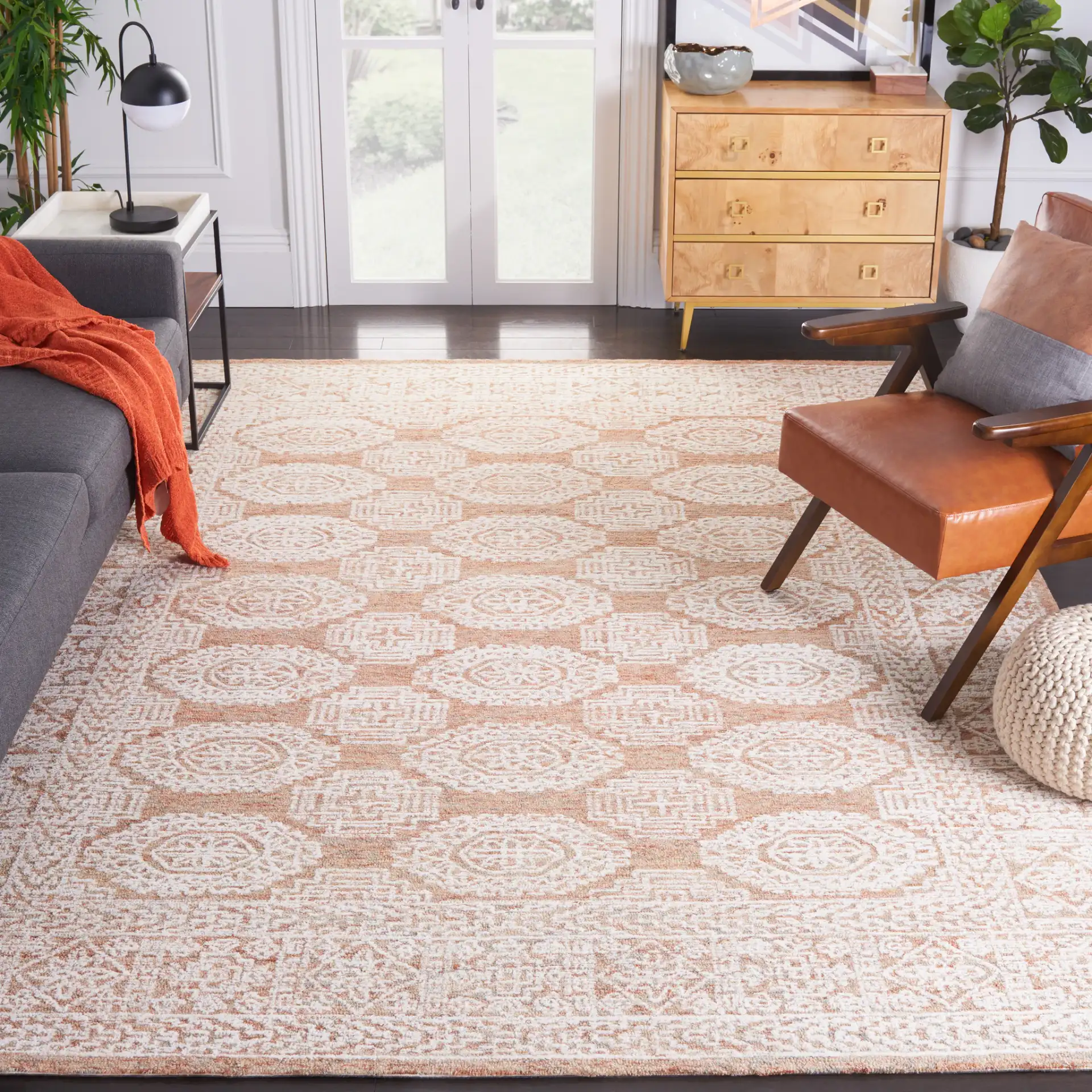 Metro Geometric Tile Hand-Tufted Wool Rug in Natural / Rust in a styled room