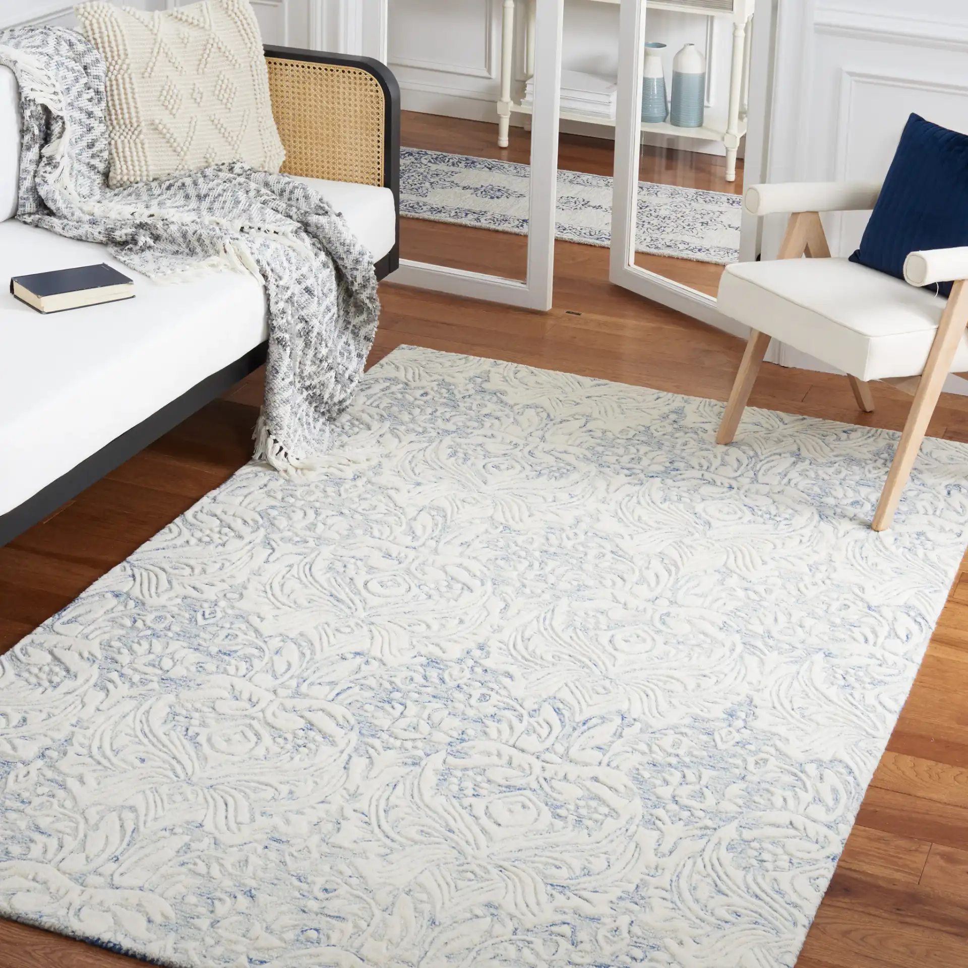 Metro Ornamental Damask Hand-Tufted Wool Rug in Blue / Ivory in a styled room