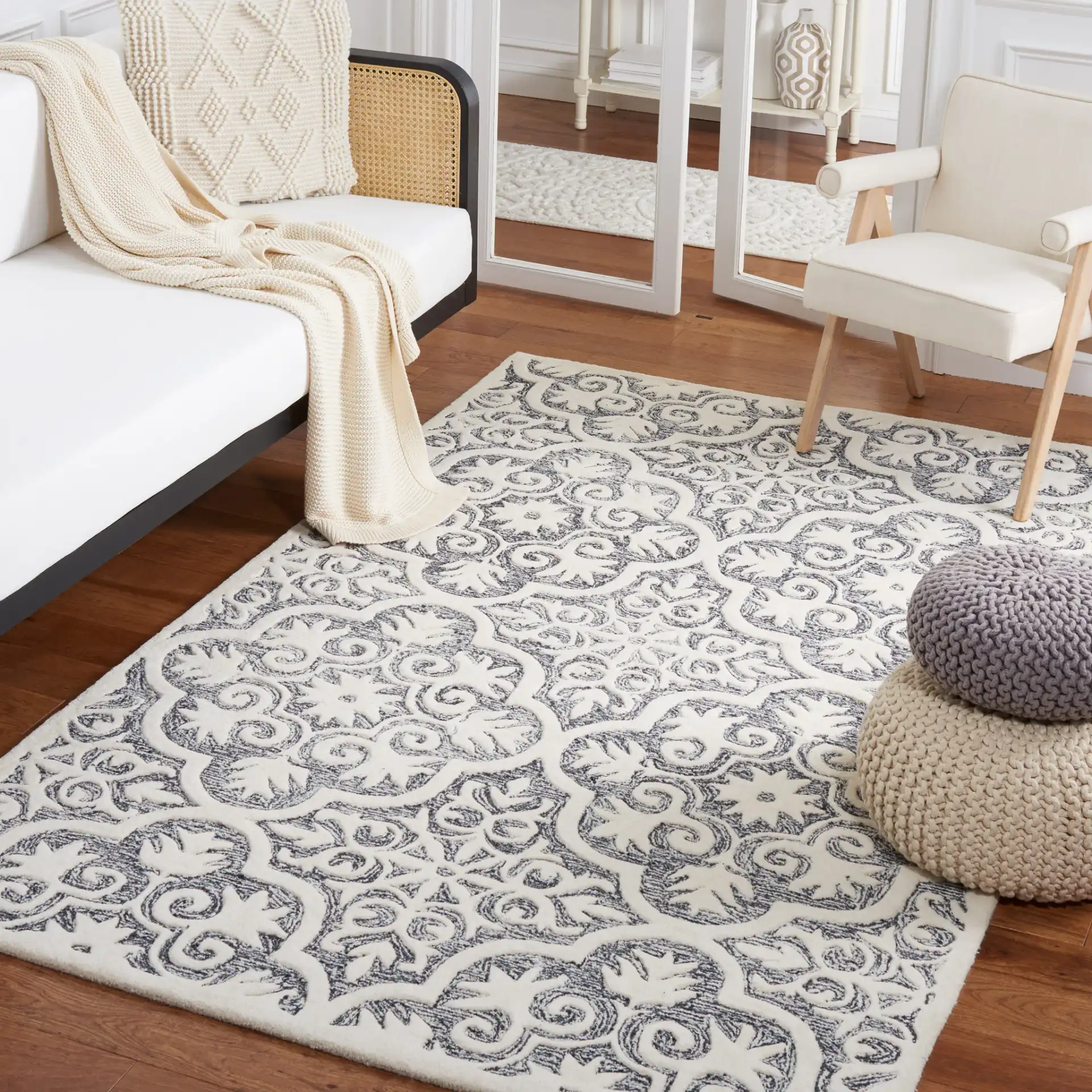 Metro Quatrefoil Tile Hand-Tufted Wool Rug in Black / Ivory in a styled room
