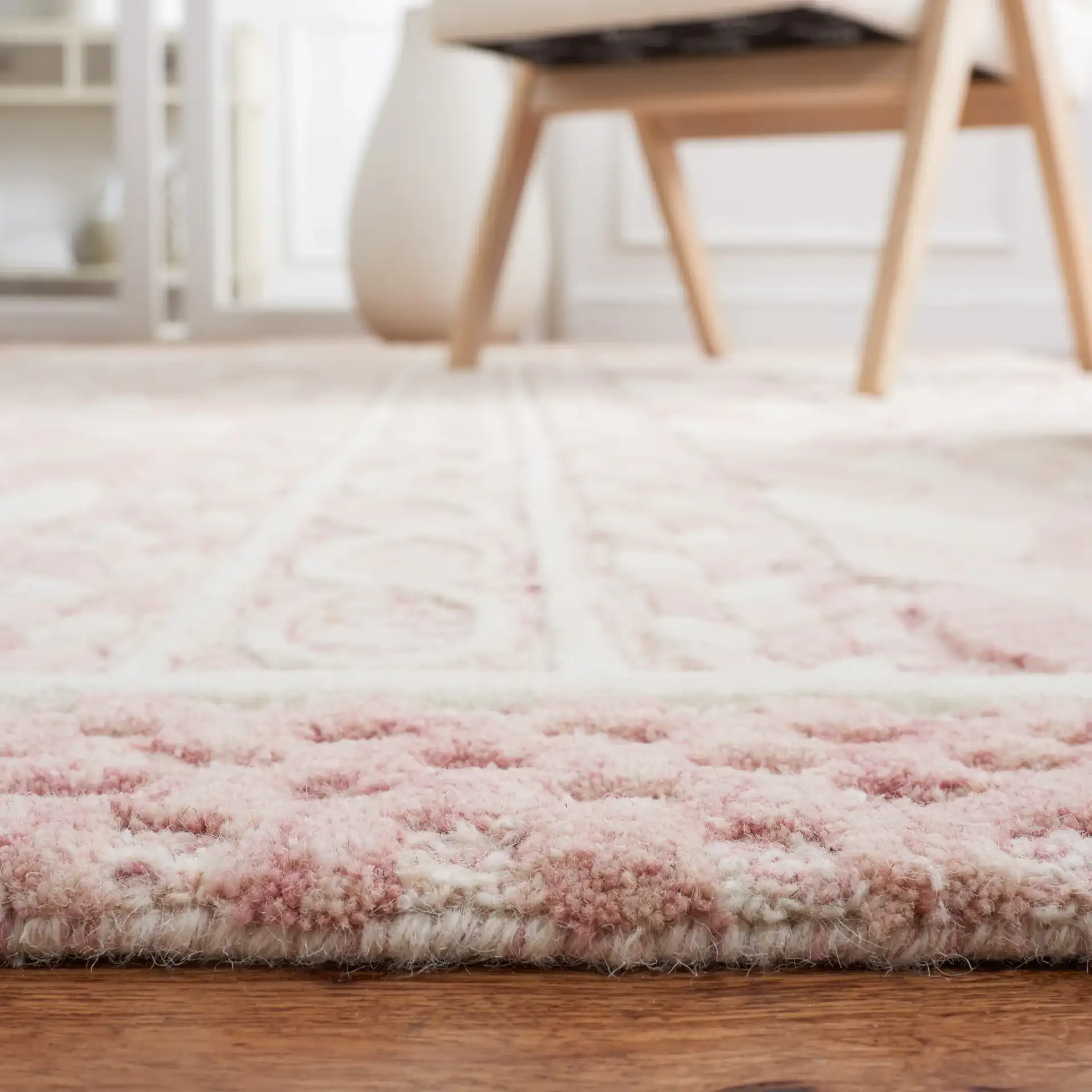 Metro Braided Stripe Hand-Tufted Wool Rug in Pink / Ivory in a styled room