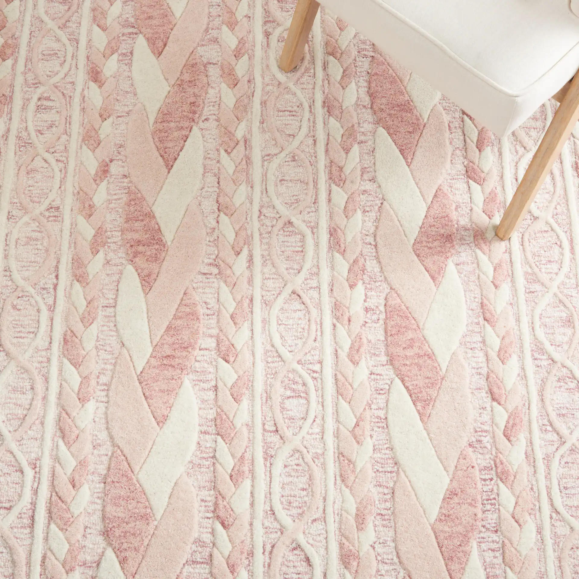 Metro Braided Stripe Hand-Tufted Wool Rug in Pink / Ivory in a styled room