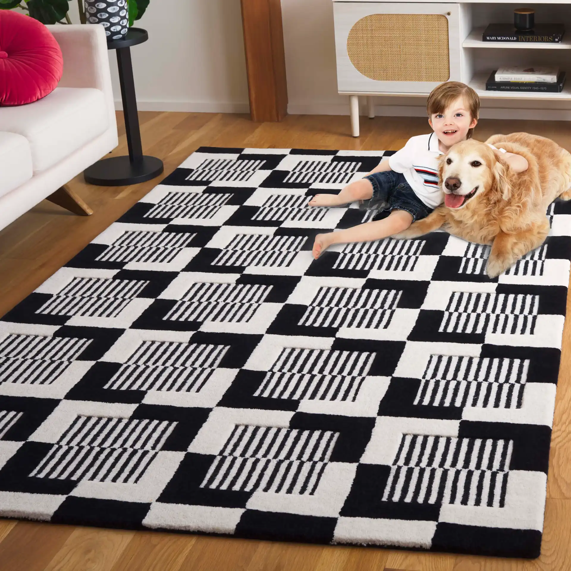 Metro Striped Checkerboard Hand-Tufted Wool Rug in Black / Ivory in a styled room