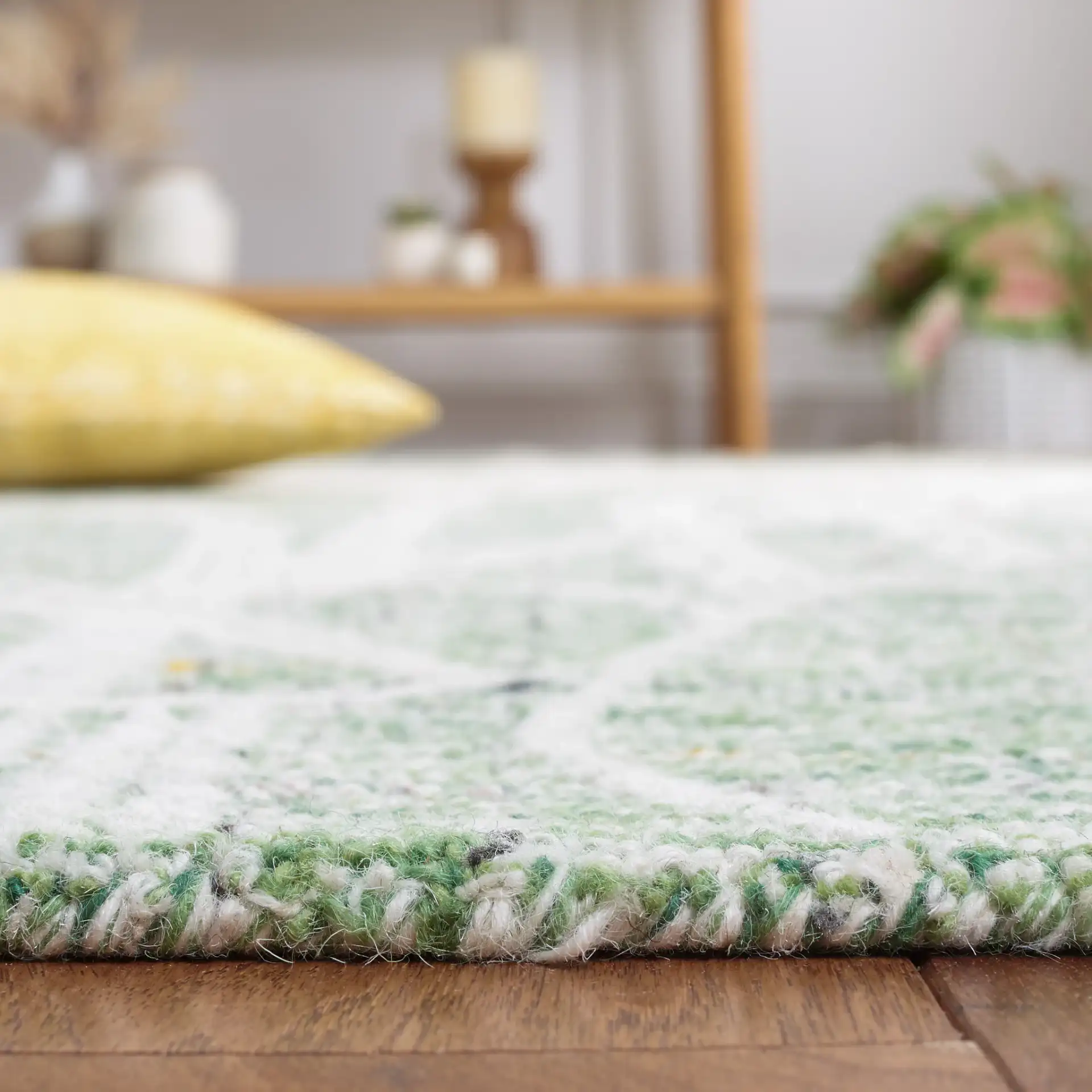 Metro Botanical Hand-Tufted Wool Rug in Green / Ivory in a styled room