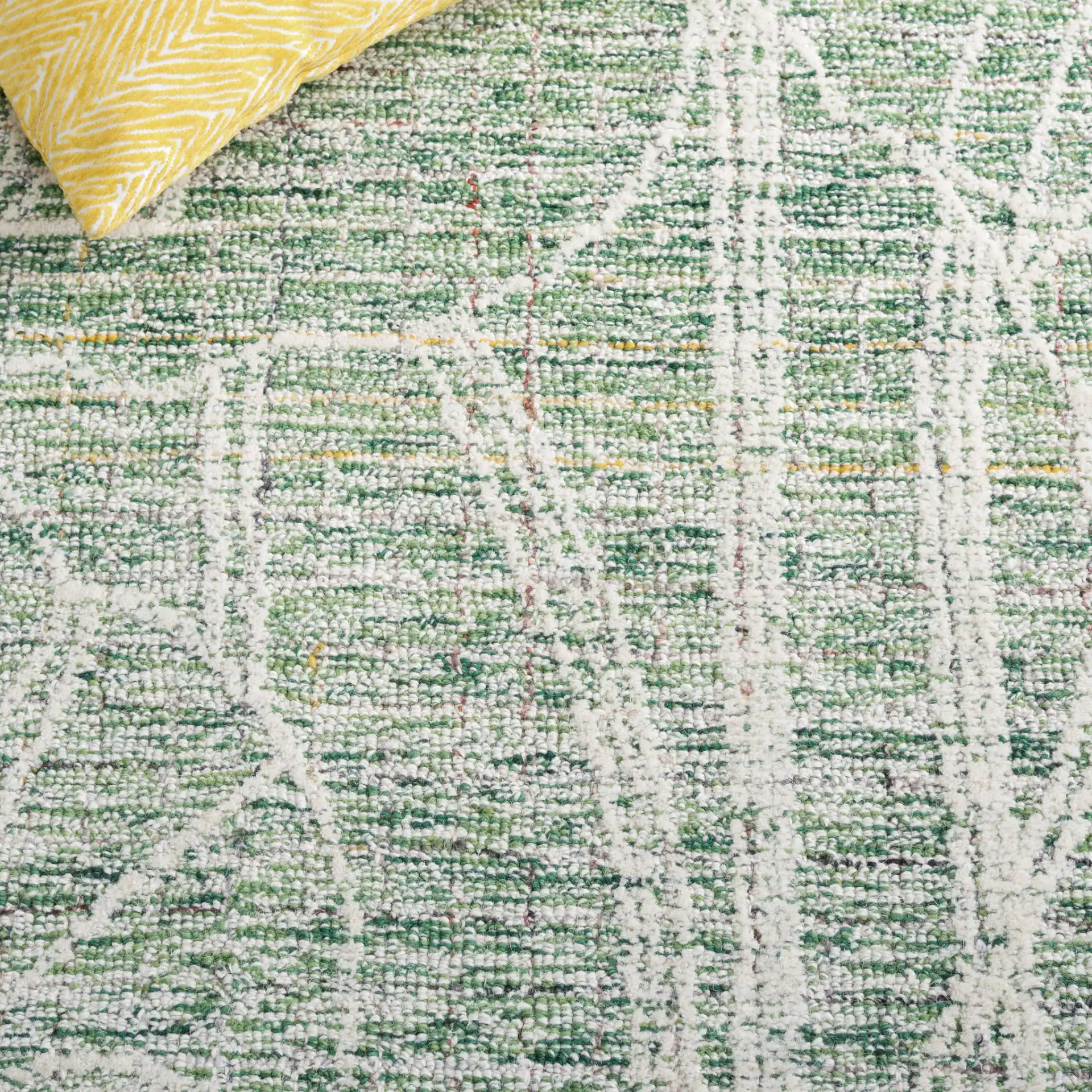 Metro Botanical Hand-Tufted Wool Rug in Green / Ivory in a styled room