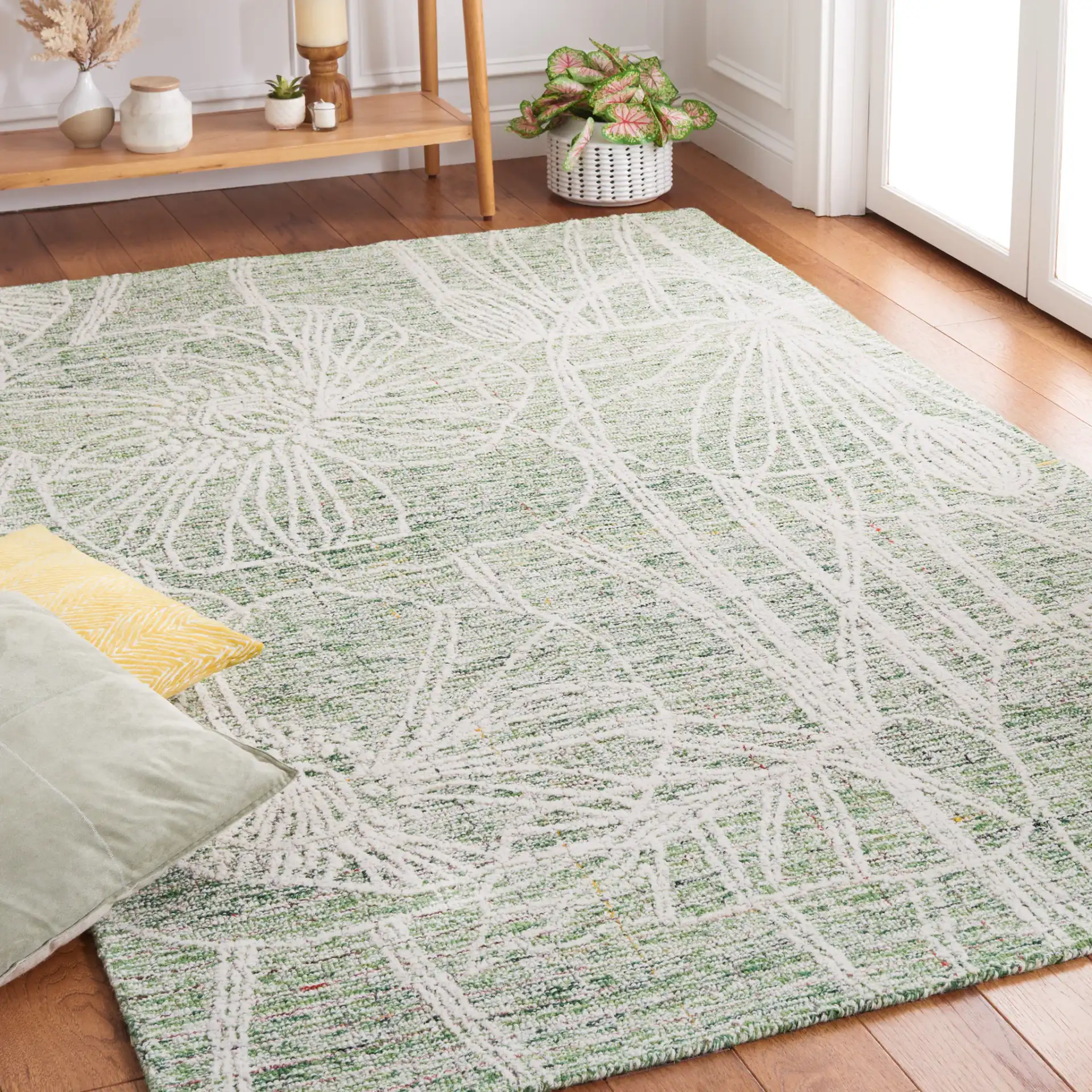 Metro Botanical Hand-Tufted Wool Rug in Green / Ivory in a styled room