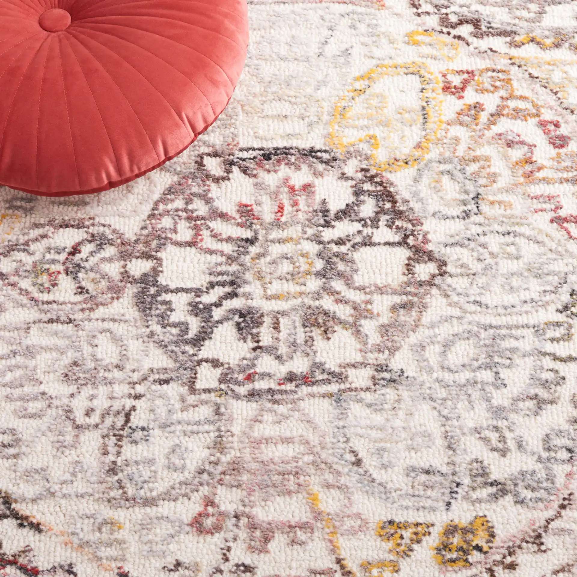 Metro Overlapping Medallion Hand-Tufted Wool Rug in Ivory / Red in a styled room