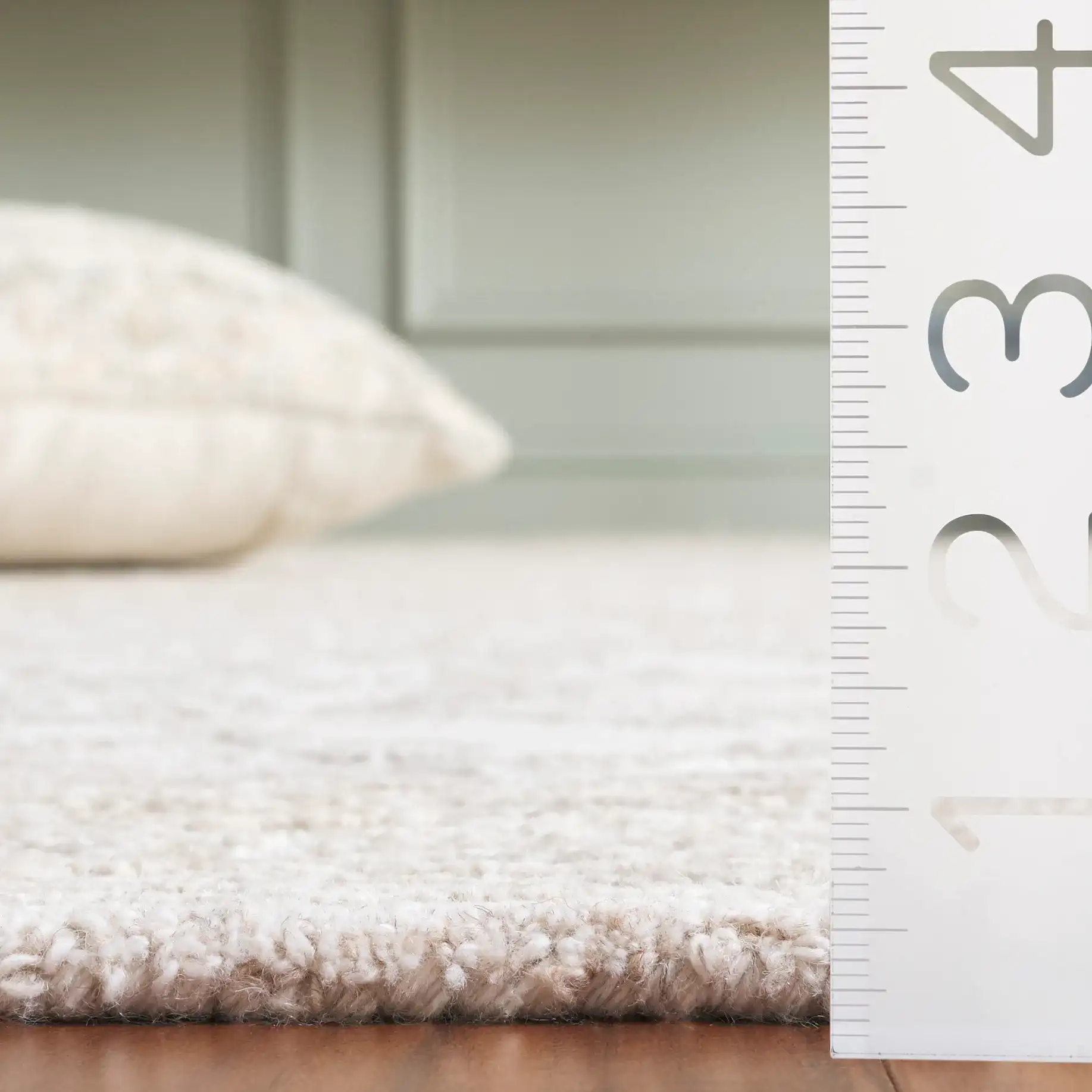 Metro Traditional Persian Medallion Hand-Tufted Wool Rug in Light Brown / Ivory in a styled room
