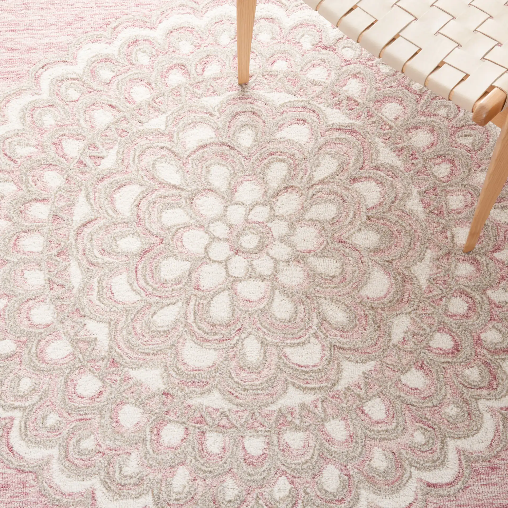 Metro Scalloped Medallion Hand-Tufted Wool Rug in Dark Pink / Ivory in a styled room