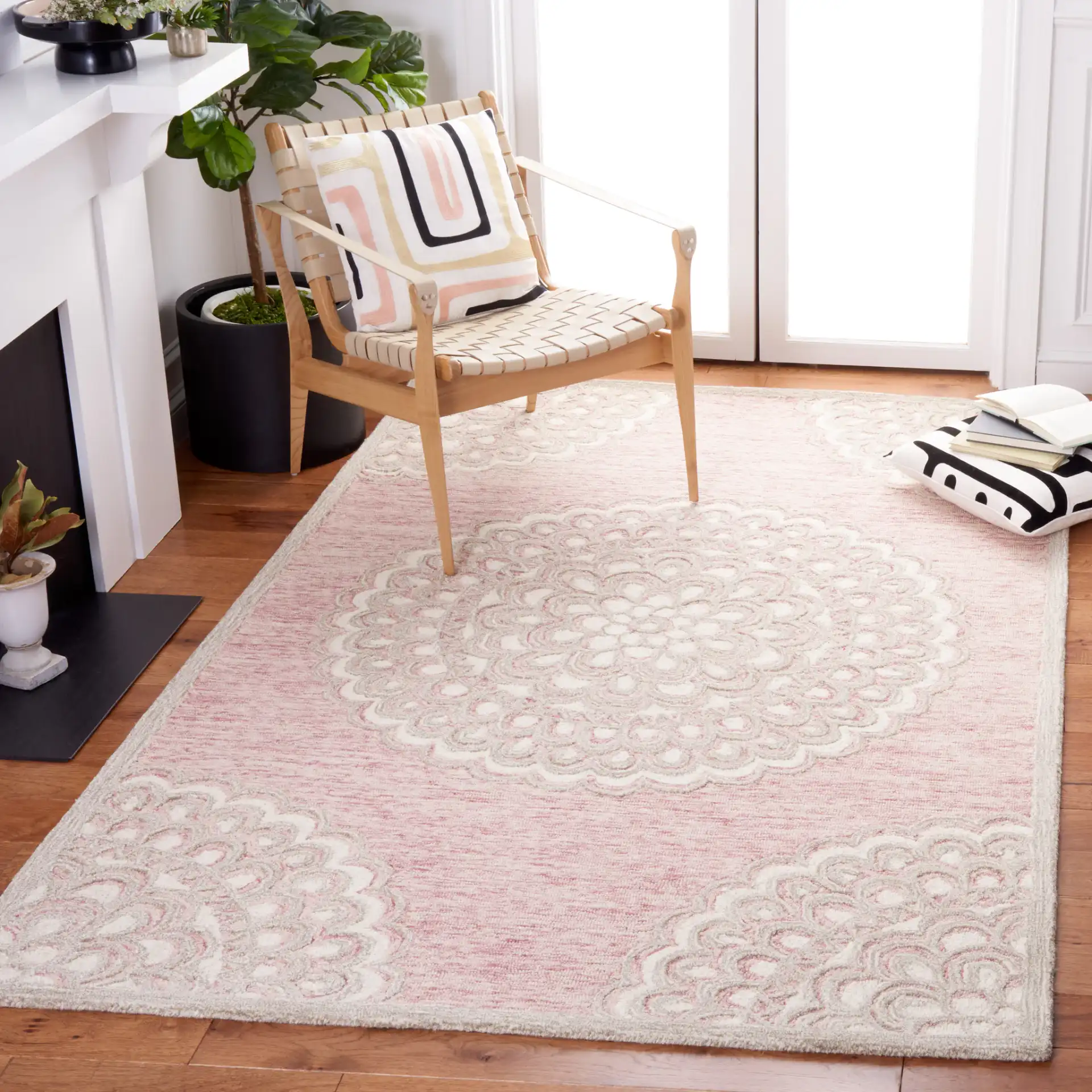 Metro Scalloped Medallion Hand-Tufted Wool Rug in Dark Pink / Ivory in a styled room