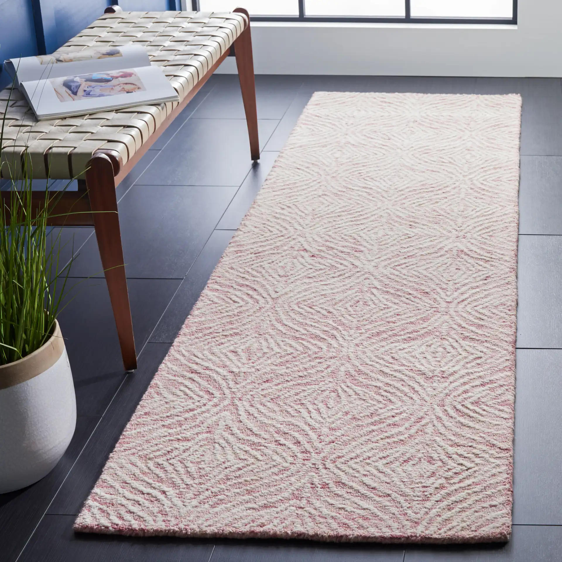 Metro Ogee Trellis Hand-Tufted Wool Rug in Dark Pink / Ivory in a styled room