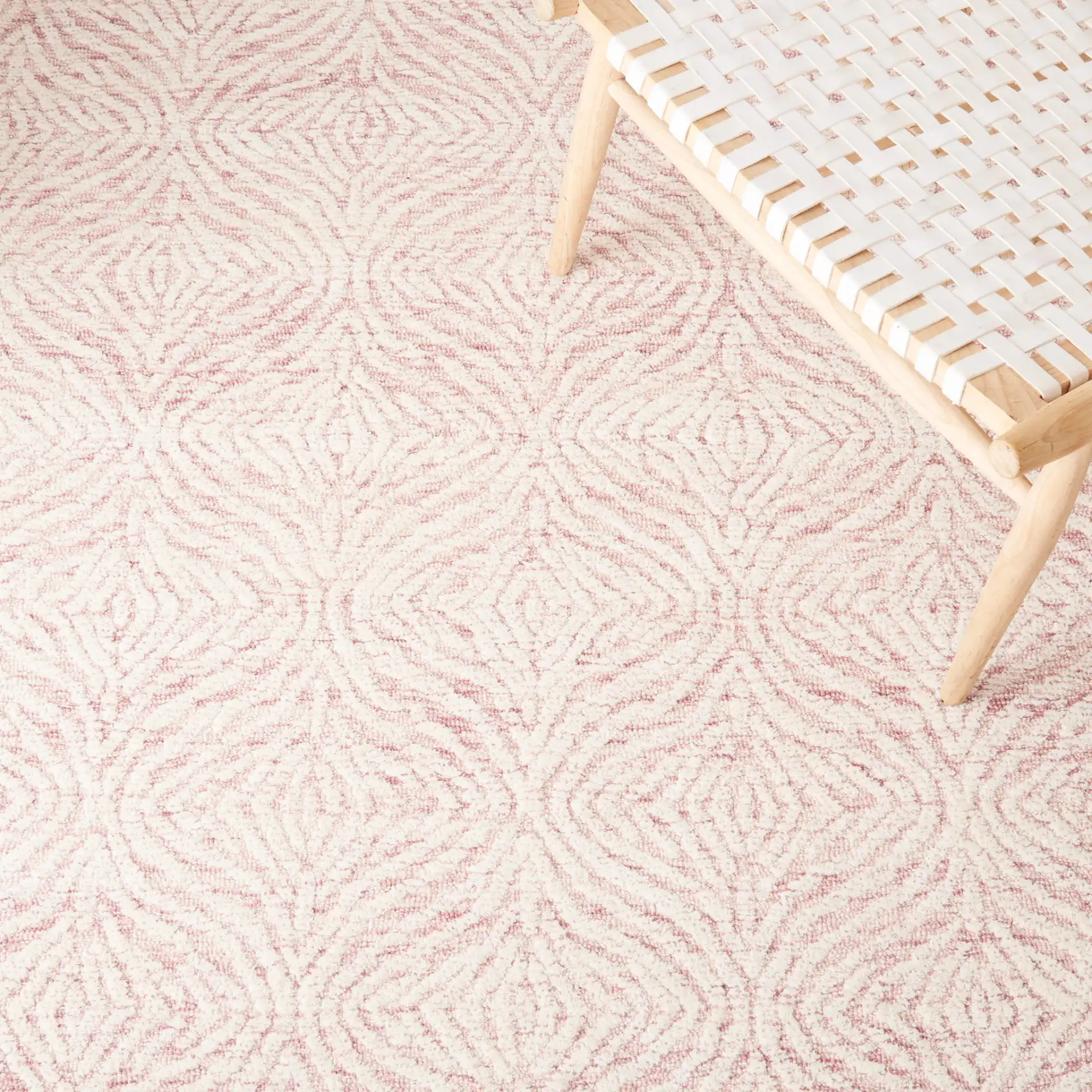 Metro Ogee Trellis Hand-Tufted Wool Rug in Dark Pink / Ivory in a styled room
