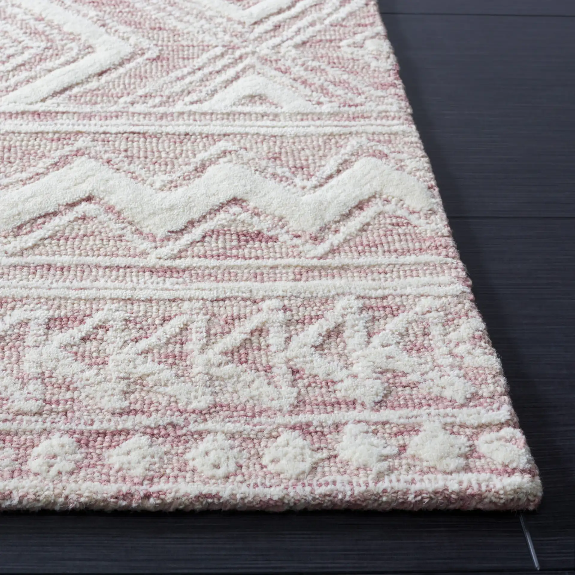 Metro Tribal Banded Hand-Tufted Wool Rug in Dark Pink / Ivory in a styled room