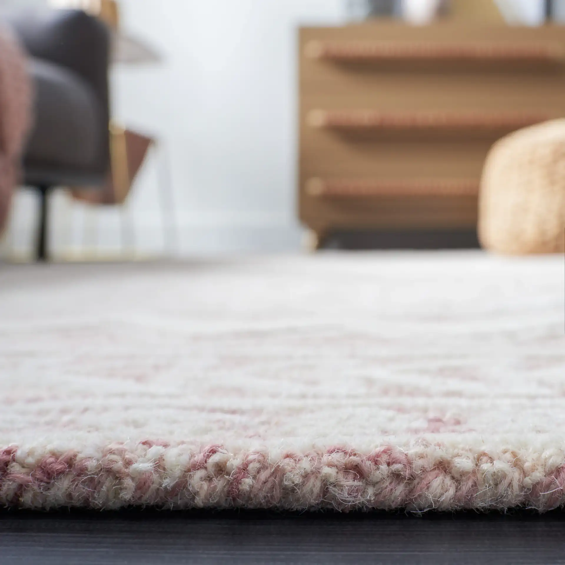 Metro Tribal Banded Hand-Tufted Wool Rug in Dark Pink / Ivory in a styled room
