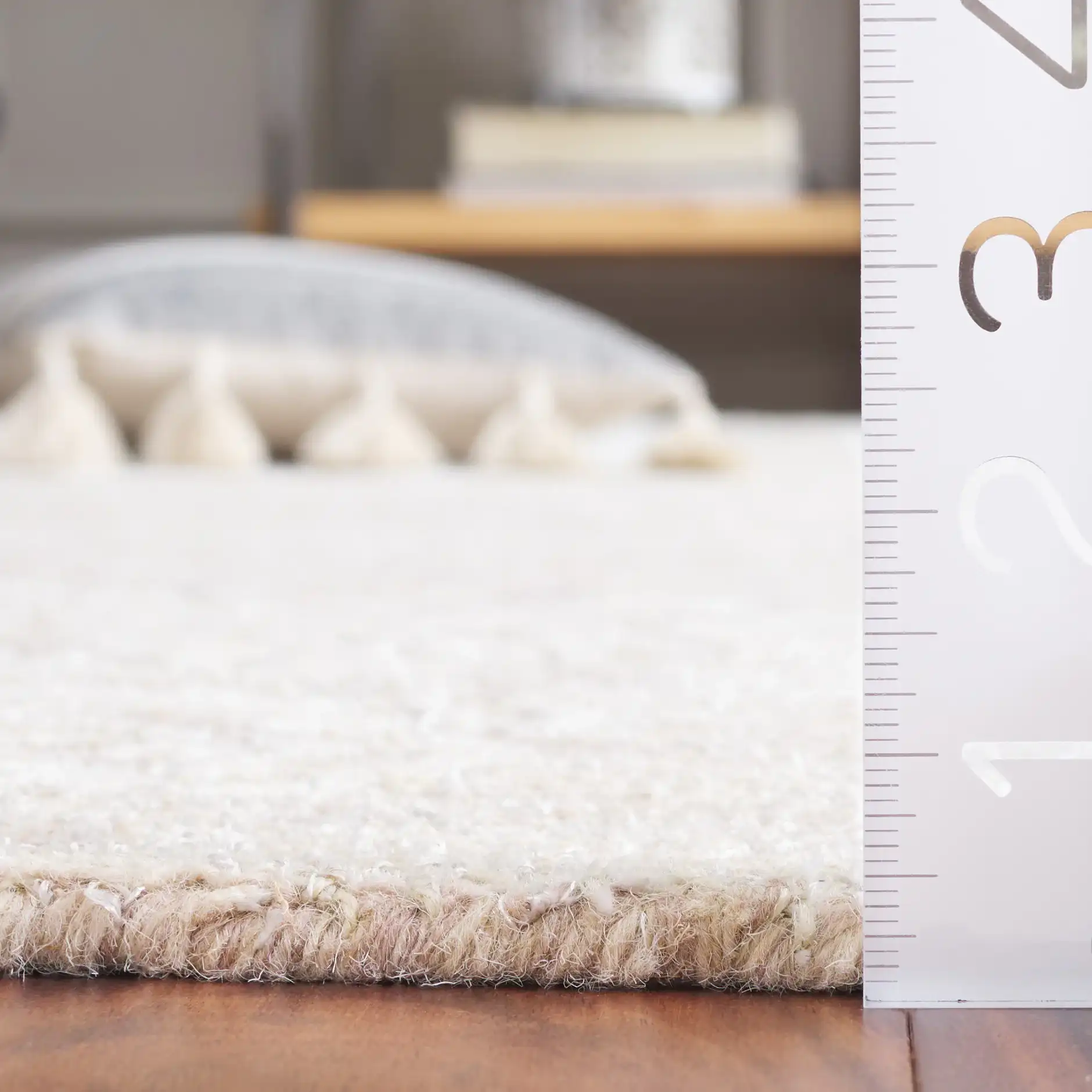Metro Floral Bouquet Hand-Tufted Rug in Beige / Ivory in a styled room