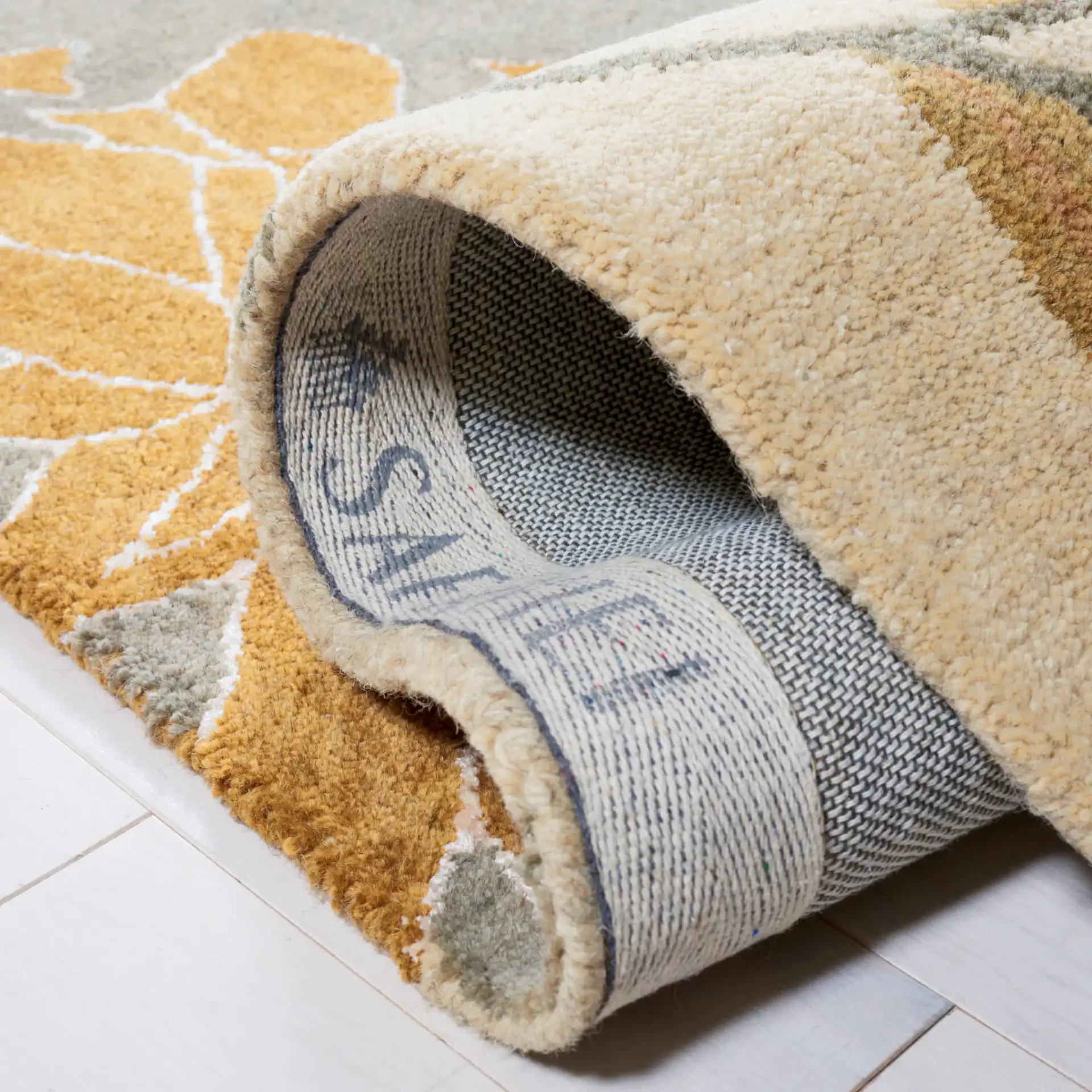 Metro Floral Hand-Tufted Wool Rug in Multicolor in a styled room