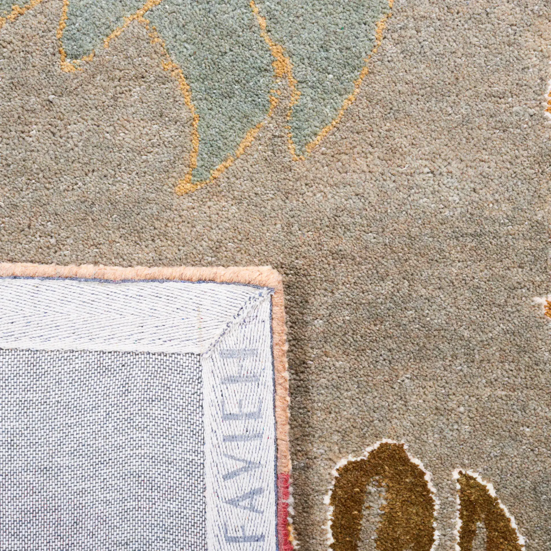Metro Floral Hand-Tufted Wool Rug in Multicolor in a styled room