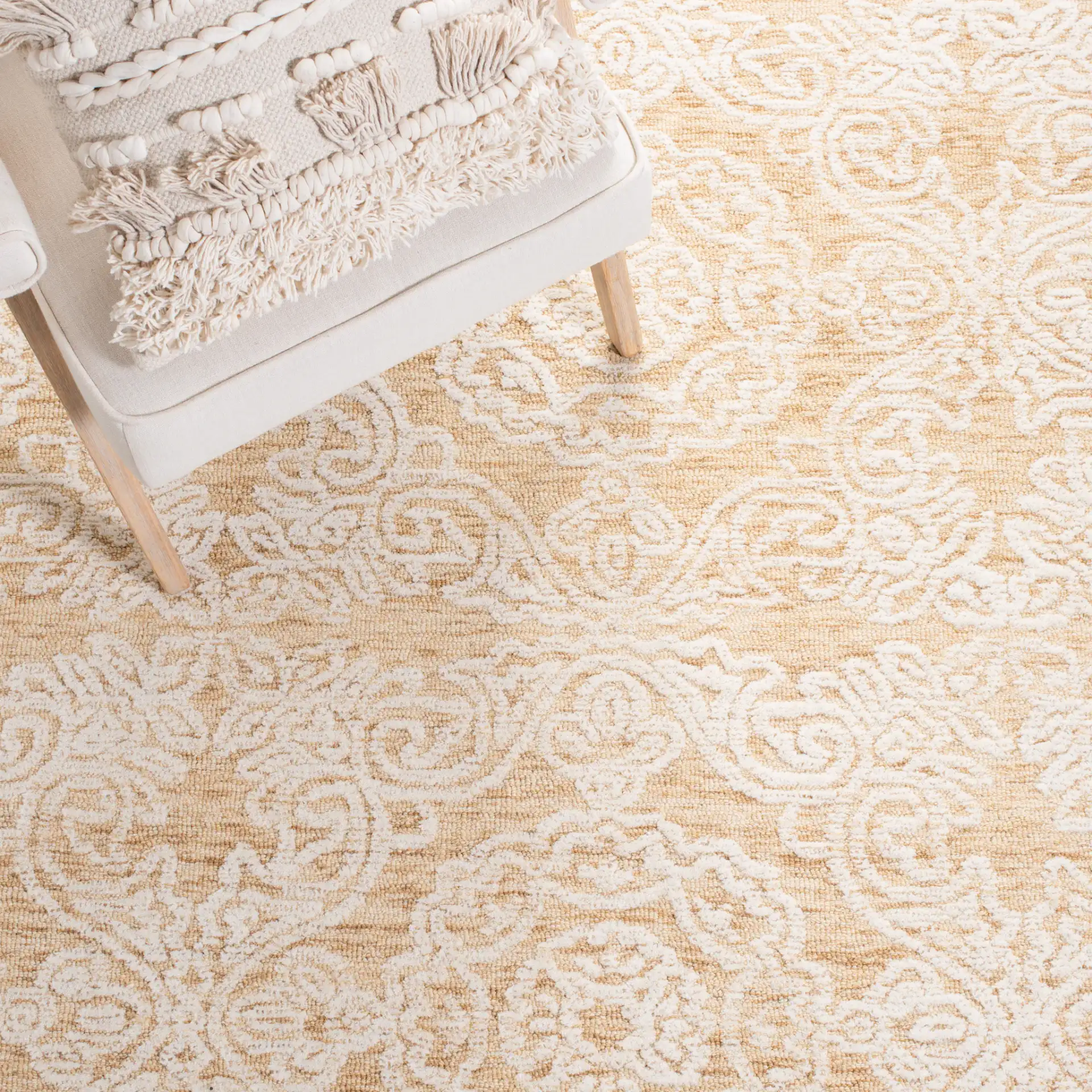 Metro Damask Medallion Hand-Tufted Wool Rug in Gold / Ivory in a styled room